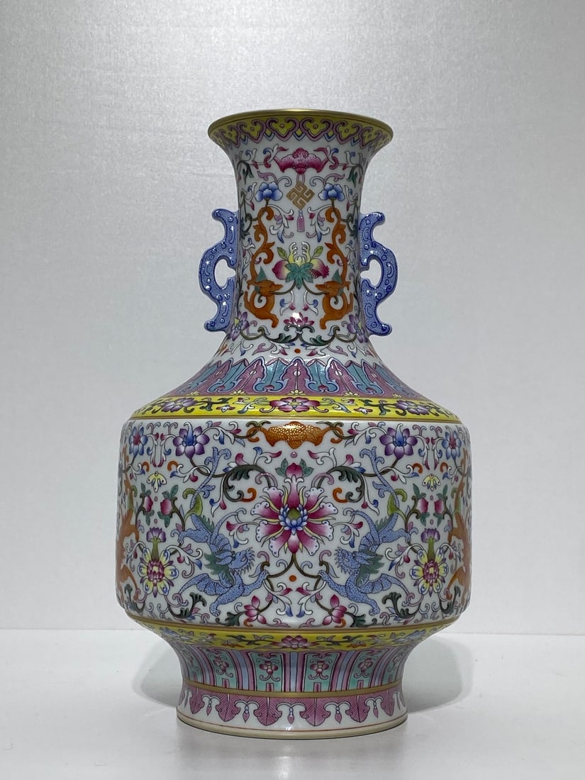 A Rare Famille-Rose Painted Gold Lotus and Dragon Pattern Double-Ears Vase: A Rare Famille-Rose Painted Gold Lotus and Dragon Pattern Double-Ears Vase,Qing Dynasty,China,Qianlong Six-character Mark,Size:12inx7.1in 粉彩描金缠枝莲࿵