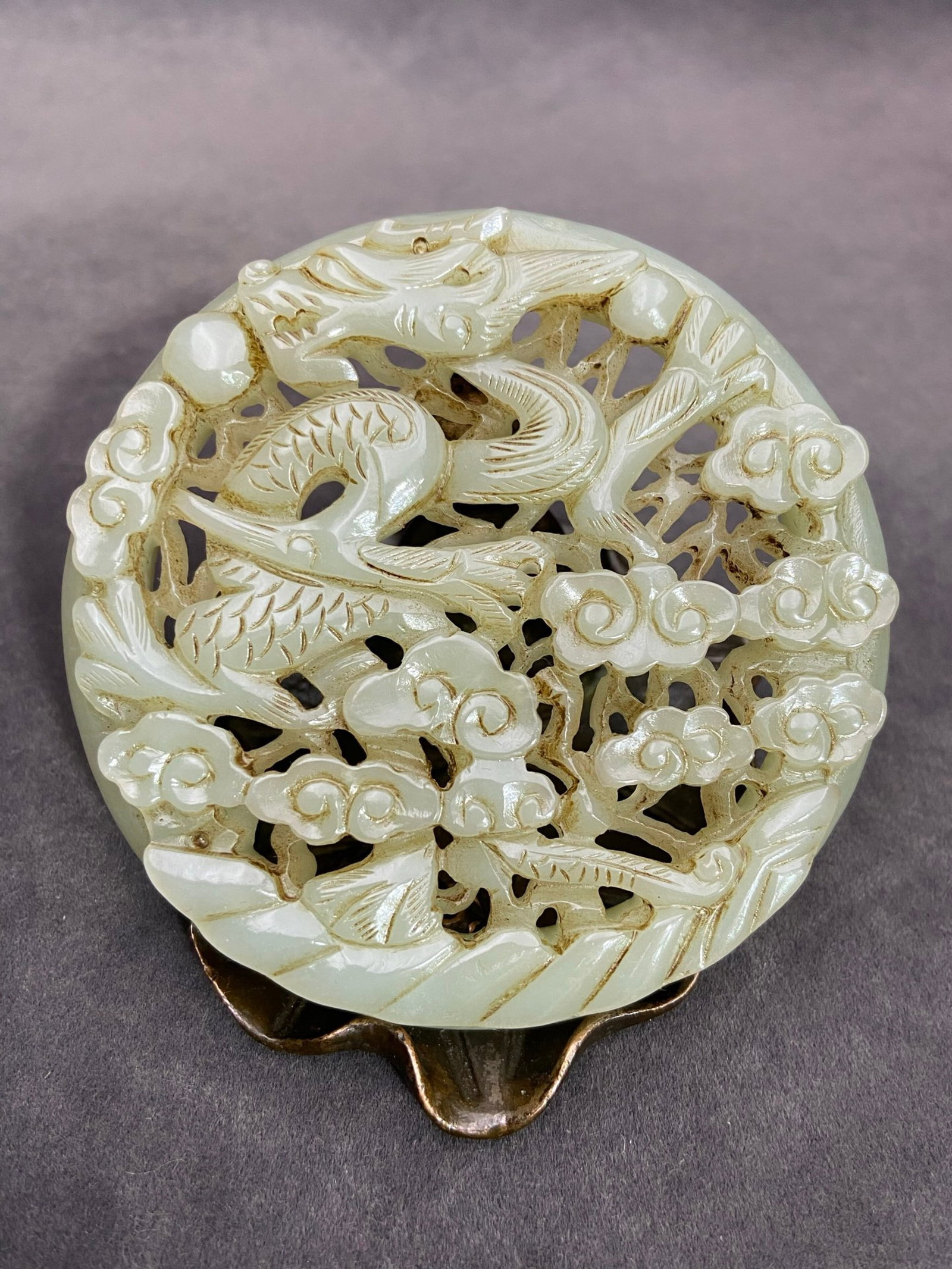 An Exquisite White Jade Hollow Auspicious Cloud and Dragon Pattern Pendant (1 of 7)