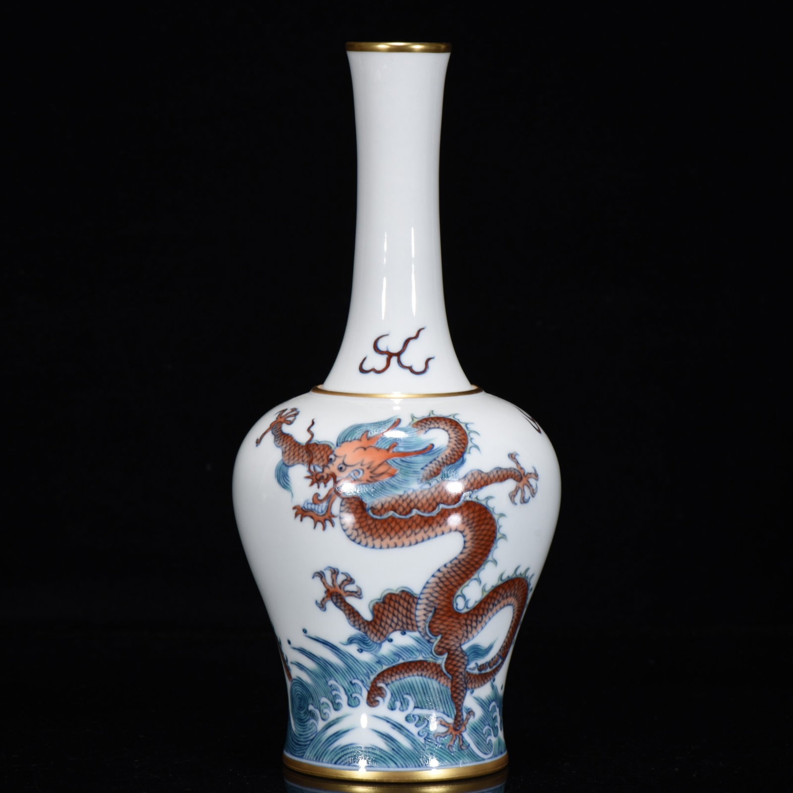 An Exquisite Wucai Painted Gold Seawater and Dragon Pattern Vase: An Exquisite Wucai Painted Gold Seawater and Dragon Pattern Vase,Qing Dynasty,China,Yongzheng Six-character Mark,Size:7.5inx4.3in 五彩描金海水龙纹ல