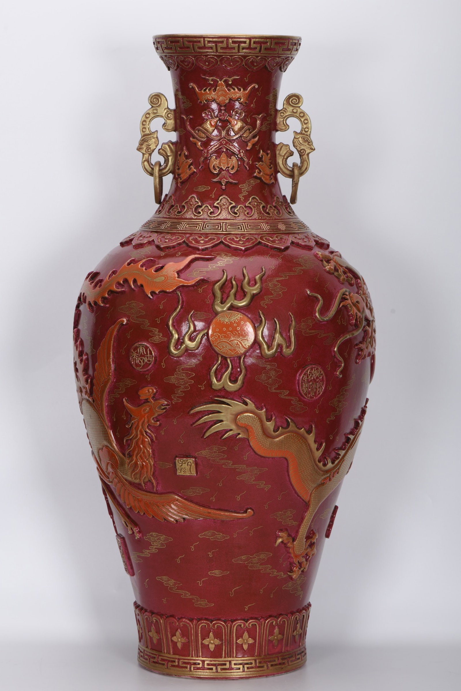 A Huge Red Glazed Painted Gold Dragon and Phoenix Pattern Double-Ears Vase: A Huge Red Glazed Painted Gold Dragon and Phoenix Pattern Double-Ears Vase,Qing Dynasty,China,Qianlong Six-character Mark,Size:32.7inx15.4in