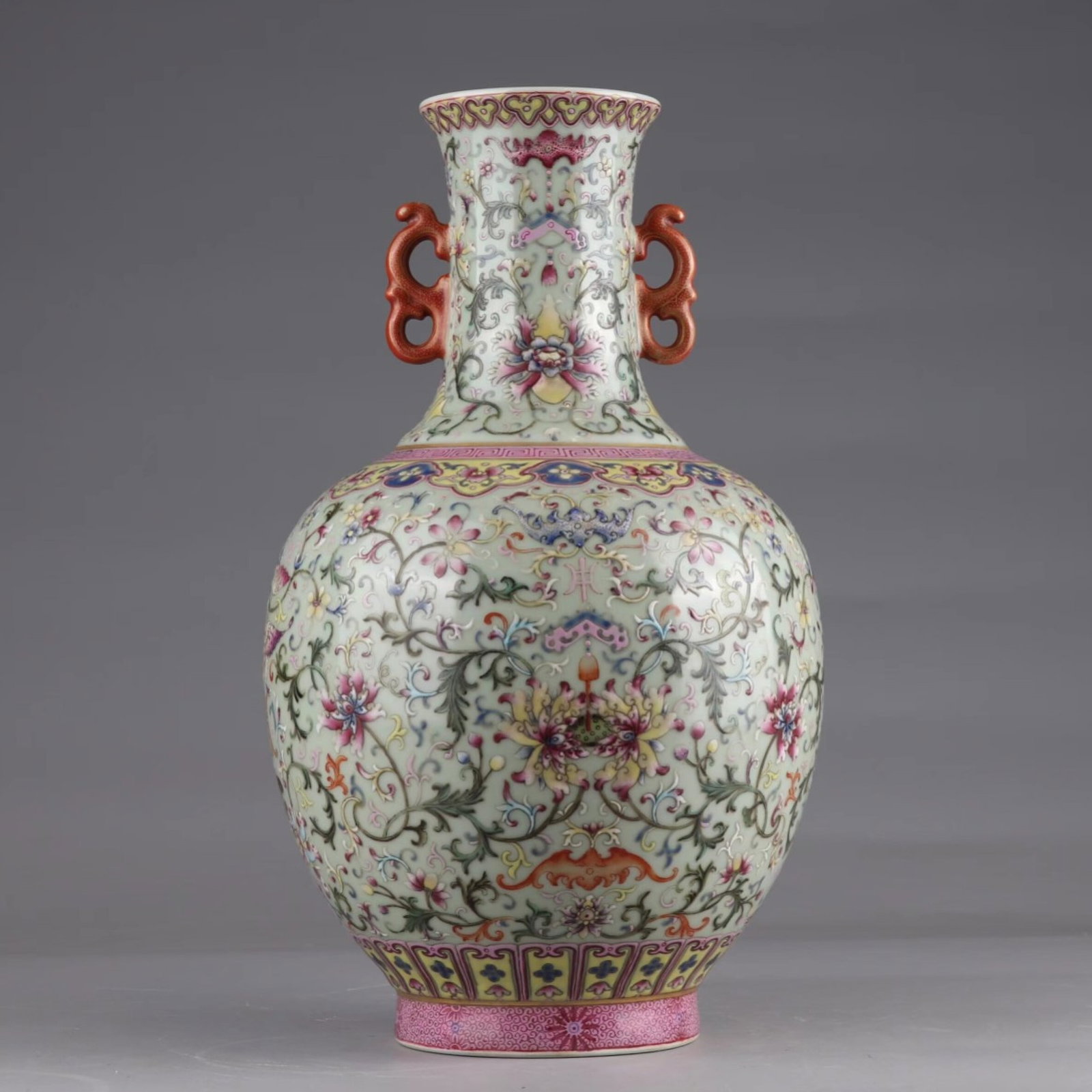 A Rare Famille-Rose Painted Gold Lotus Pattern Double-Ears Vase: A Rare Famille-Rose Painted Gold Lotus Pattern Double-Ears Vase,Qing Dynasty,China,Qianlong Six-character Mark,Size:12.3inx7.1in