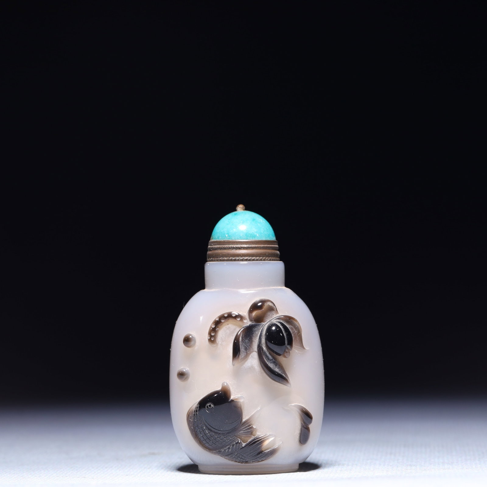 An Exquisite Glass Lotus Fish Pattern Vase: An Exquisite Glass Lotus Fish Pattern Vase,Qing Dynasty,China,Size:1.4inx0.8inx2.4in,Weight:50.8g 琉璃莲花鱼纹瓶,中国清代
