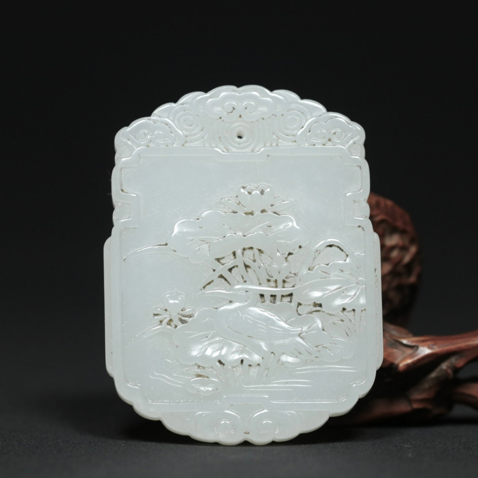 An Exquisite White Jade Lotus Crane Pattern Pendant: An Exquisite White Jade Lotus Crane Pattern Pendant,Qing Dynasty,China,Size:2.2inx1.7inx0.3in,Weight:35.8g 白玉莲花鹤纹挂件,中国清