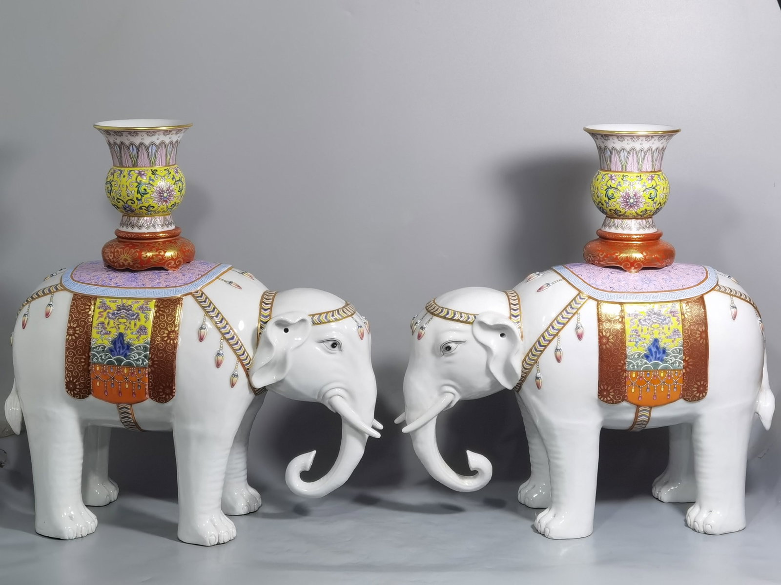 A Pair of Rare Famille-Rose Lotus Pattern Elephant Ornaments: A Pair of Rare Famille-Rose Lotus Pattern Elephant Ornaments,Qing Dynasty,China,Qianlong Six-character Mark,Size:13.2inx13in