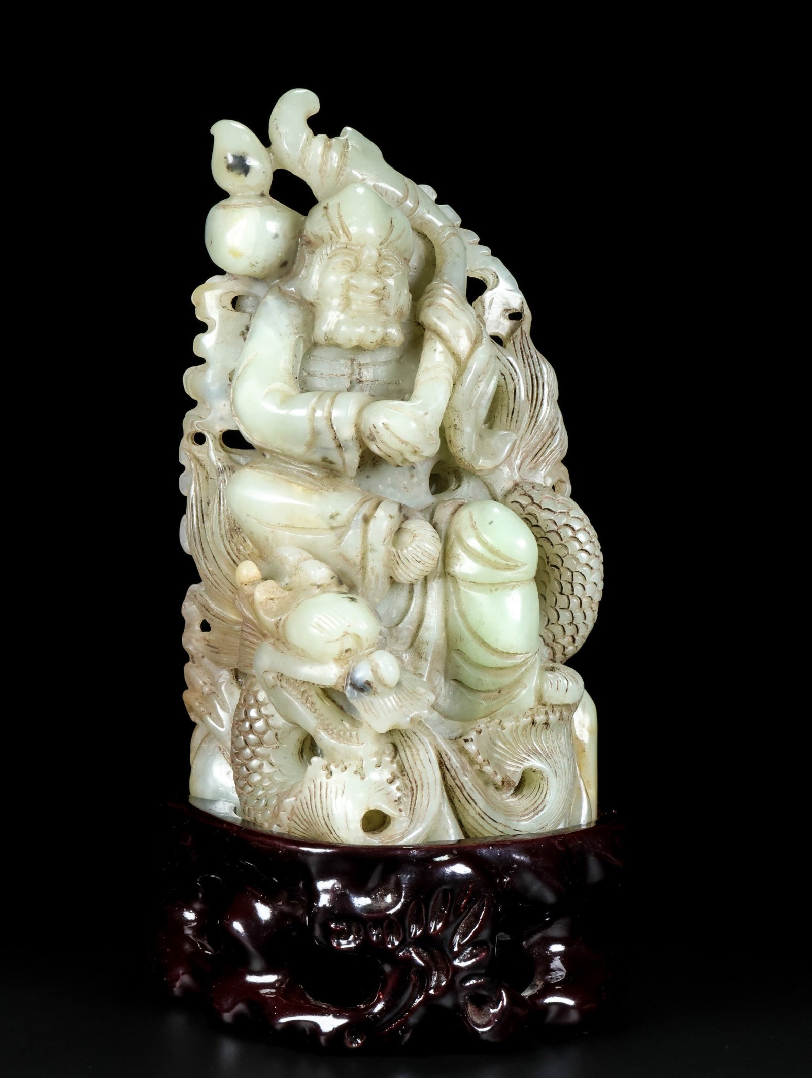 An Exquisite White Jade Figure Ornament: An Exquisite White Jade Figure Ornament,Qing Dynasty,China,Qianlong Four-character Mark,Size:7.9inx5.1inx3.9in,Weight:1986g