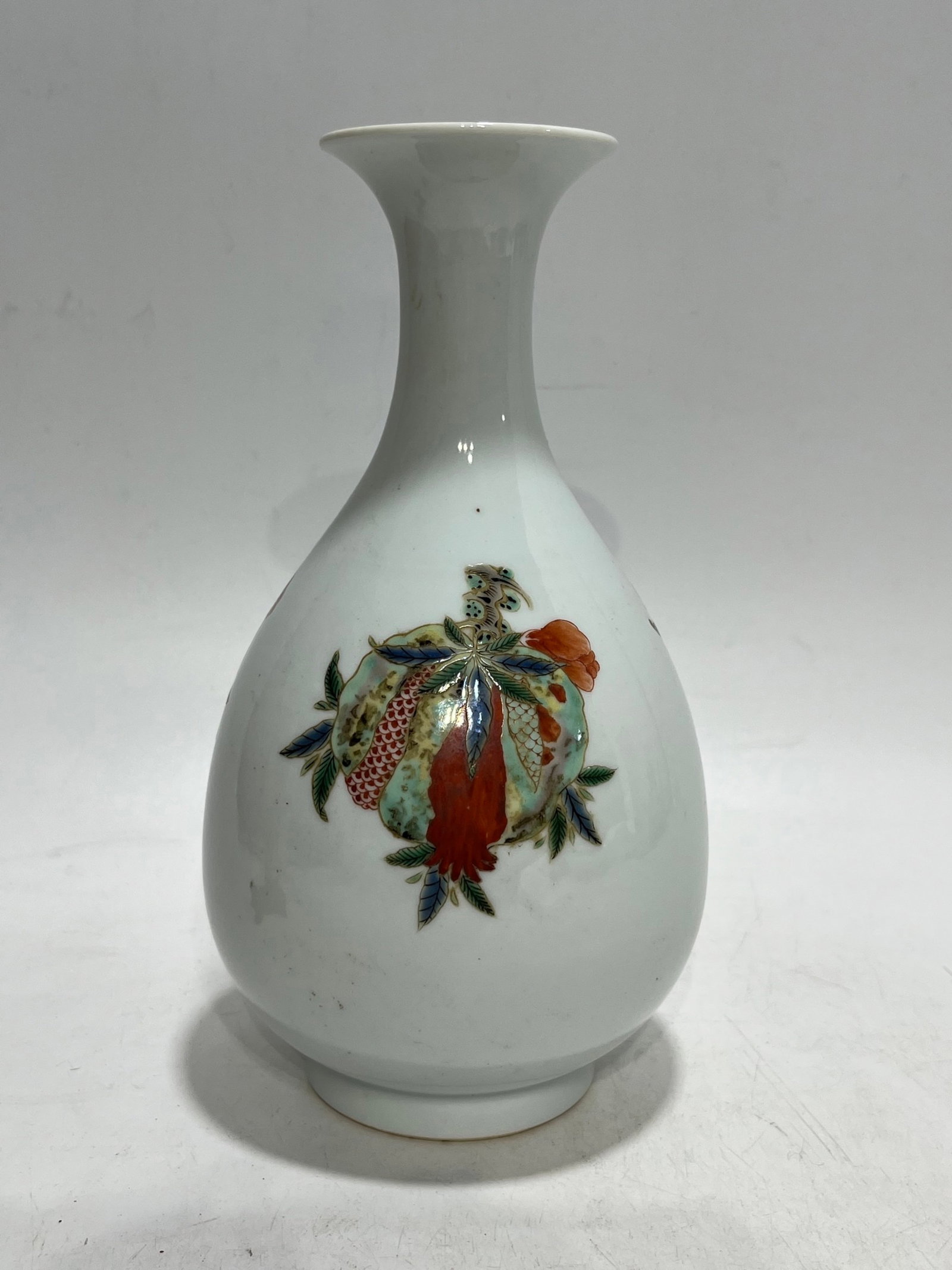 An Exquisite Blue and White Wucai Fruit Pattern Vase (1 of 8)