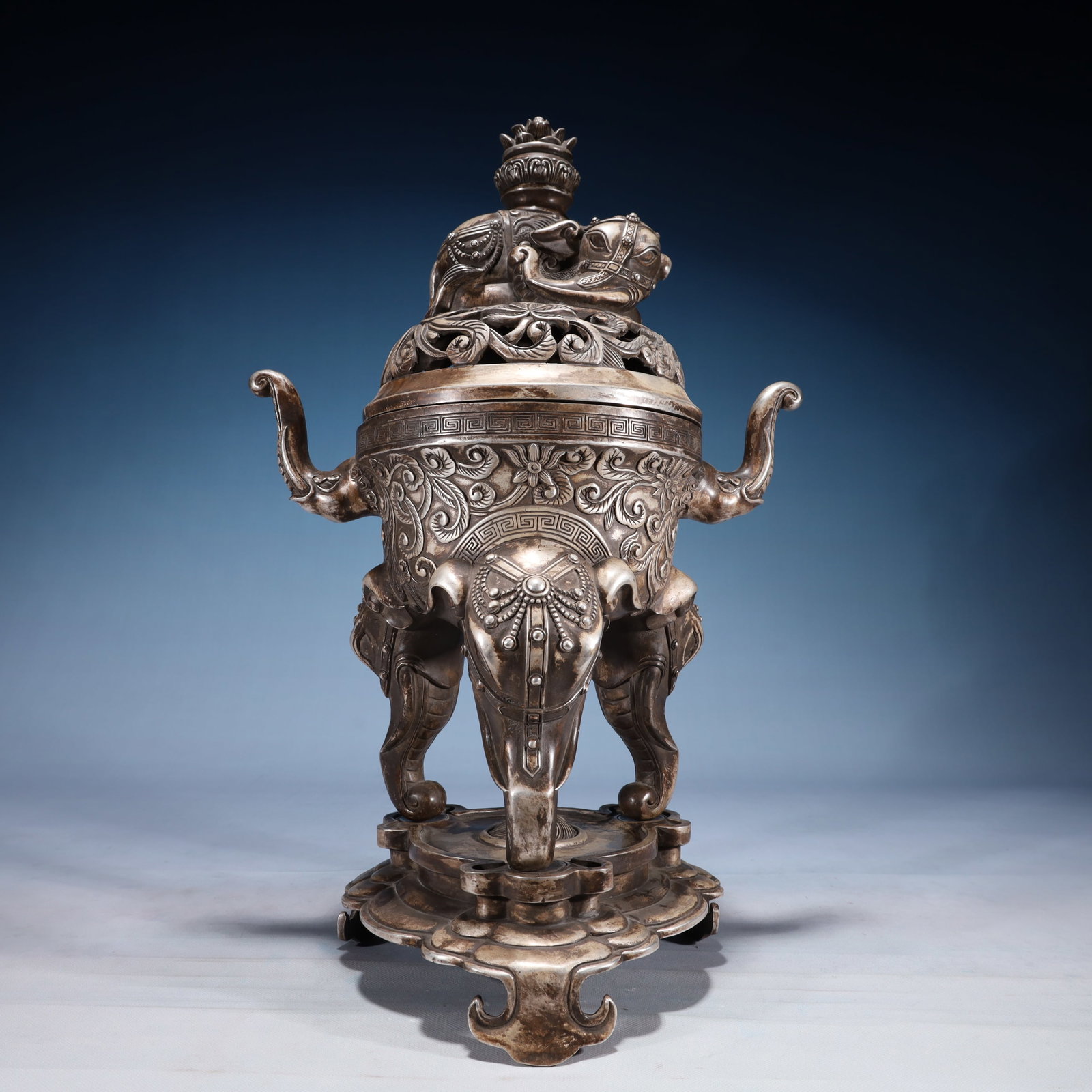 An Exquisite Silver-plated Bronze Lotus Pattern Double-Ears and Tripod Censer: An Exquisite Silver-plated Bronze Lotus Pattern Double-Ears and Tripod Censer,Qing Dynasty,China,Qianlong Four-character Mark,Size:9.4inx8.7inx19.7in,Weight:6750g 铜镀银缠ĉ