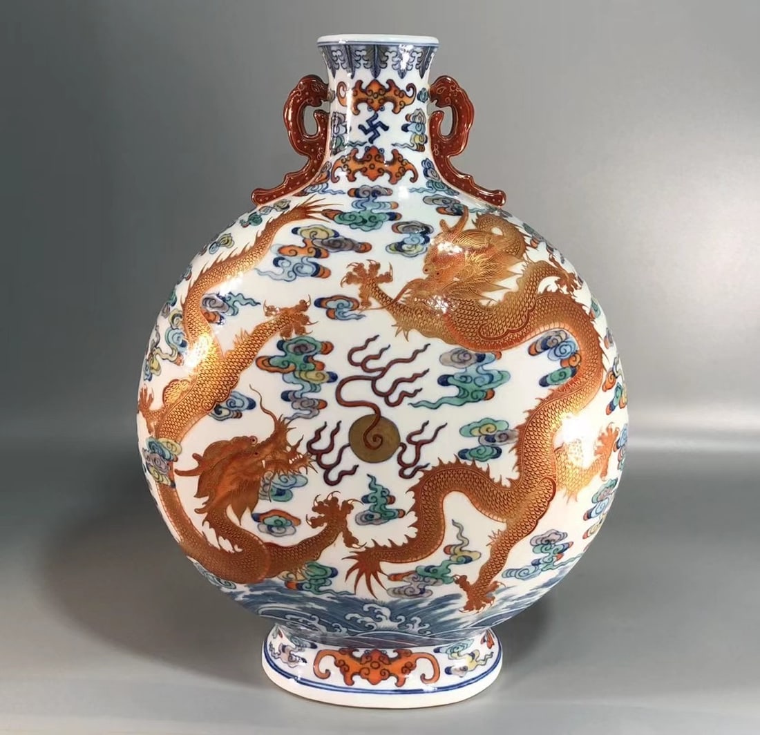 A Rare Blue and White Doucai Painted Gold Auspicious Cloud and Dragon Pattern Double-Ears Vase: A Rare Blue and White Doucai Painted Gold Auspicious Cloud and Dragon Pattern Double-Ears Vase,Qing Dynasty,China,Qianlong Six-character Mark,Size:13.7inx10.2in 青花斗彩描