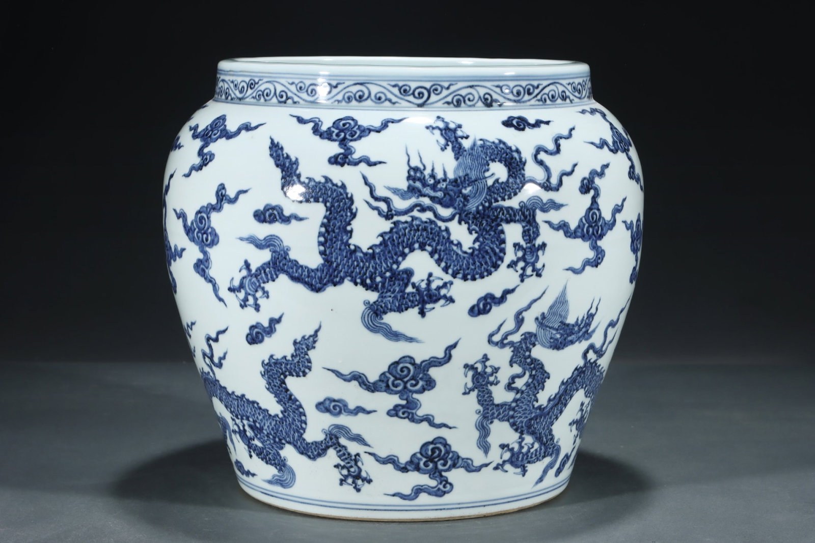 An Exquisite Blue and White Auspicious Cloud and Dragon Pattern Jar,with Chinese Vertical Scroll Ink: An Exquisite Blue and White Auspicious Cloud and Dragon Pattern Jar,with Chinese Vertical Scroll Ink Painting on Silk,Ming Dynasty,China,Xuande Six-character Mark,Size:(Without frame)24.2inx11.8in,(Po