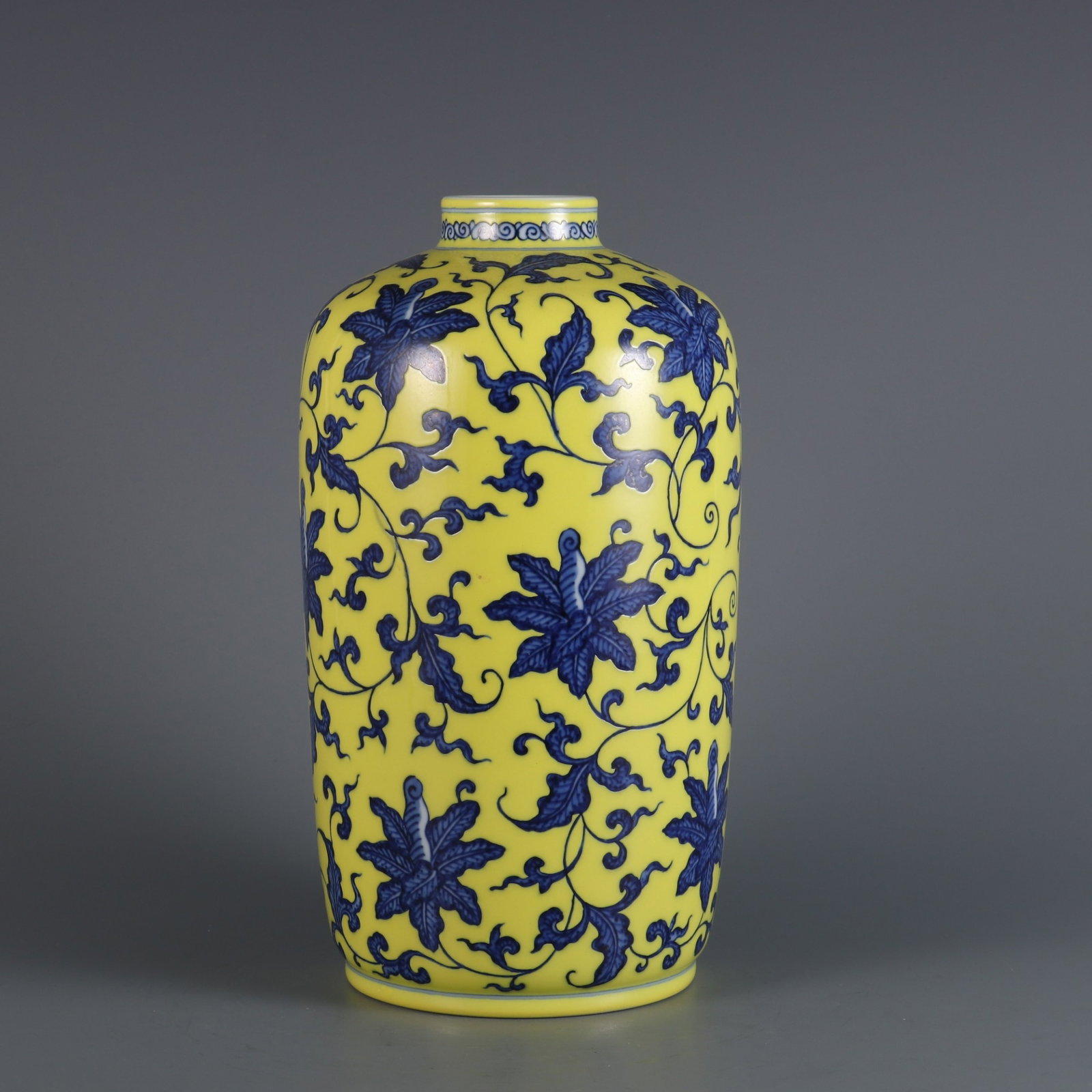 An Exquisite Yellow Ground Blue and White Lotus Pattern Vase: An Exquisite Yellow Ground Blue and White Lotus Pattern Vase,Qing Dynasty,China,Yongzheng Six-character Mark,Size:10inx5.1in