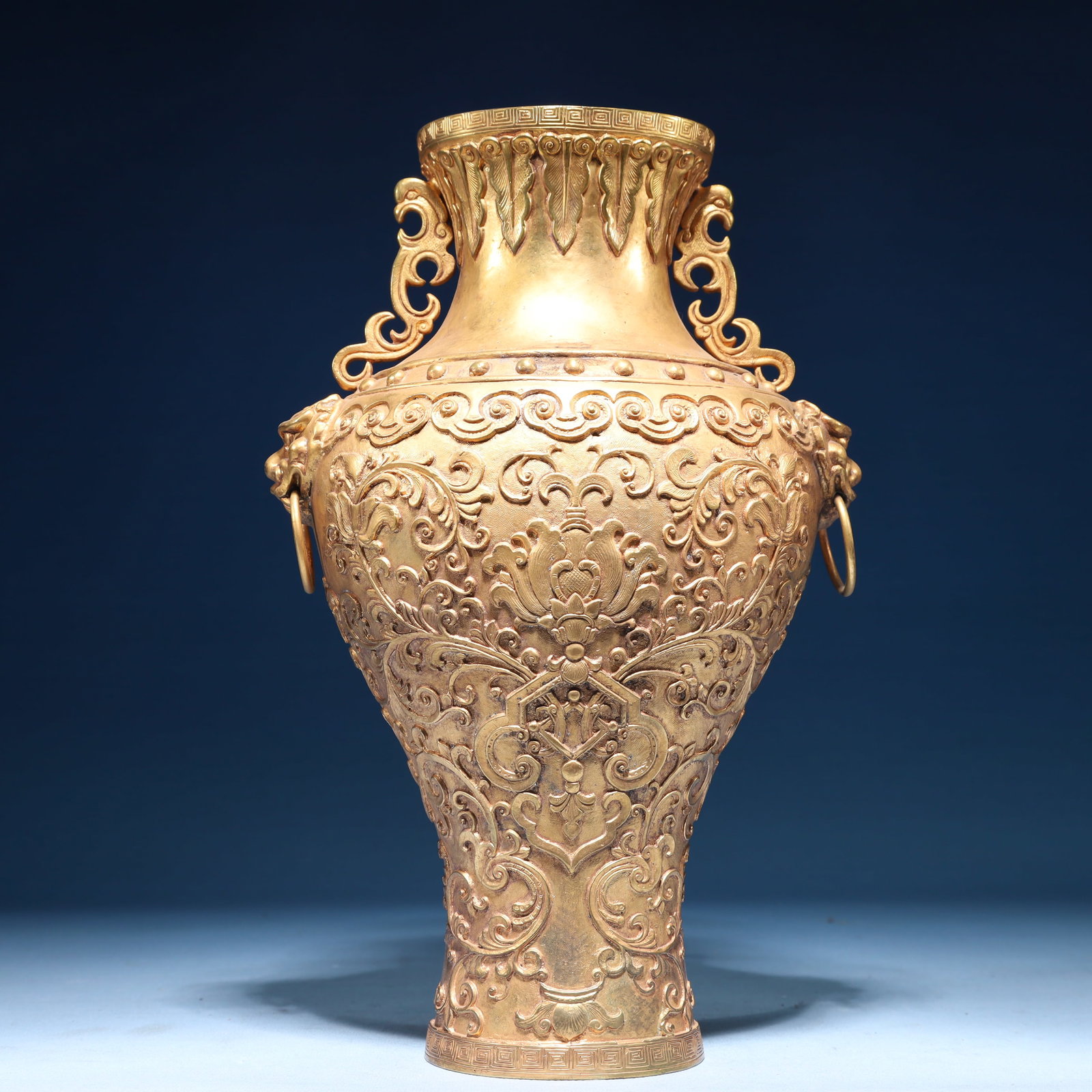 An Exquisite Gilt Bronze Lotus Pattern Double-Ears Vase: An Exquisite Gilt Bronze Lotus Pattern Double-Ears Vase,Qing Dynasty,China,Size:7.5inx4.7inx11.8in,Weight:3150g