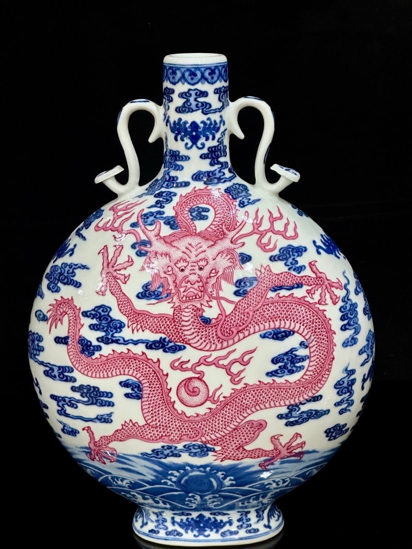 A Rare Blue and White Agate Red-Glazed Auspicious Cloud and Dragon Pattern Double-Ears Vase: A Rare Blue and White Agate Red-Glazed Auspicious Cloud and Dragon Pattern Double-Ears Vase,Qing Dynasty,China,Qianlong Six-character Mark,Size:13.4inx9.4in