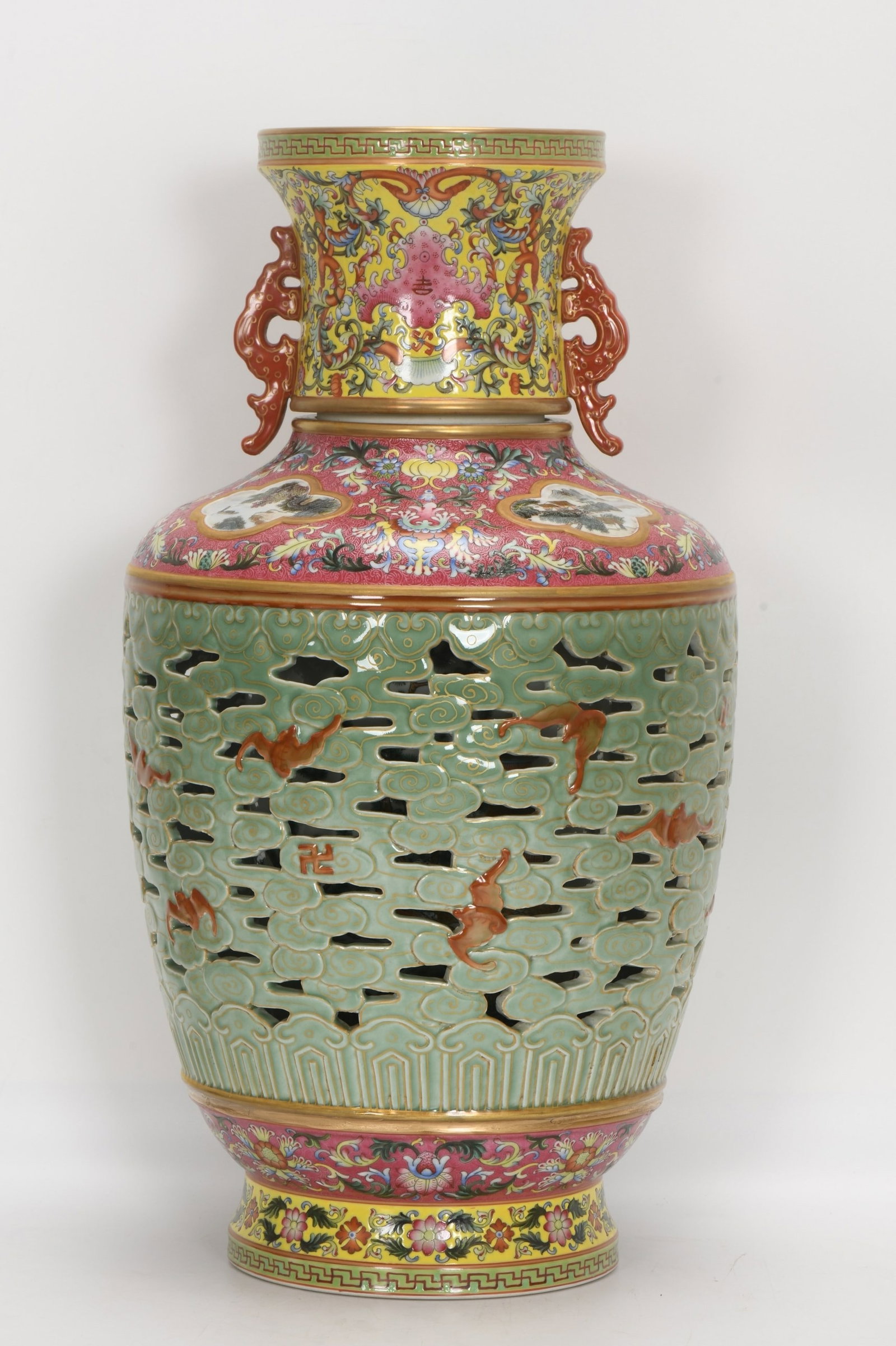 A Huge Enamel Celadon Glazed Auspicious Cloud and Bats Pattern Double-Ears Vase: A Huge Enamel Celadon Glazed Auspicious Cloud and Bats Pattern Double-Ears Vase,Qing Dynasty,China,Qianlong Six-character Mark,Size:19.1inx10.2in 珐琅彩青釉祥ߛ