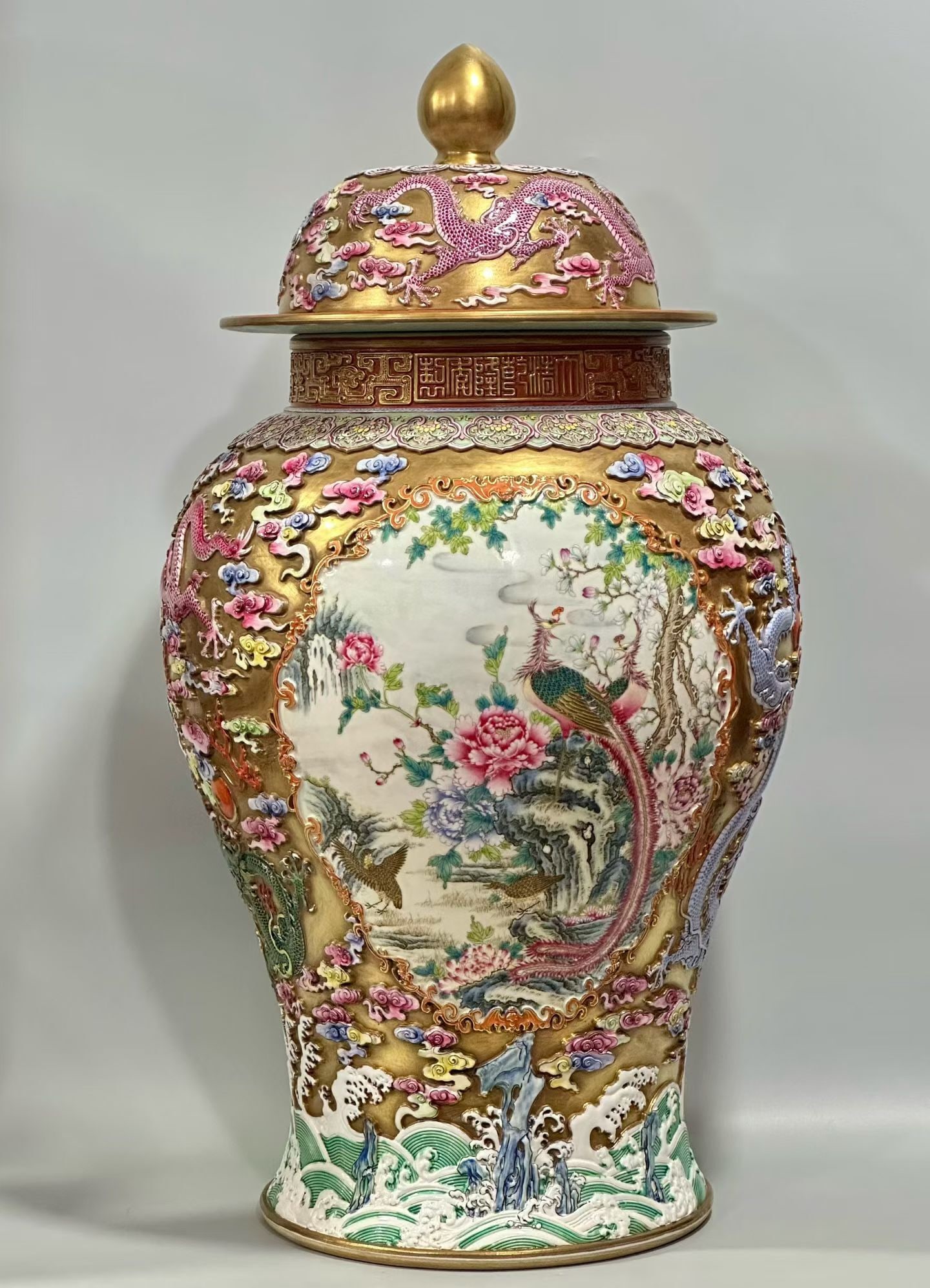 A Huge Gold Ground Famille-Rose Flower and Phoenix Pattern Jar with Cover: A Huge Gold Ground Famille-Rose Flower and Phoenix Pattern Jar with Cover,Qing Dynasty,China,Qianlong Six-character Mark,Size:26.4inx14.2in 金地粉彩花卉凤 