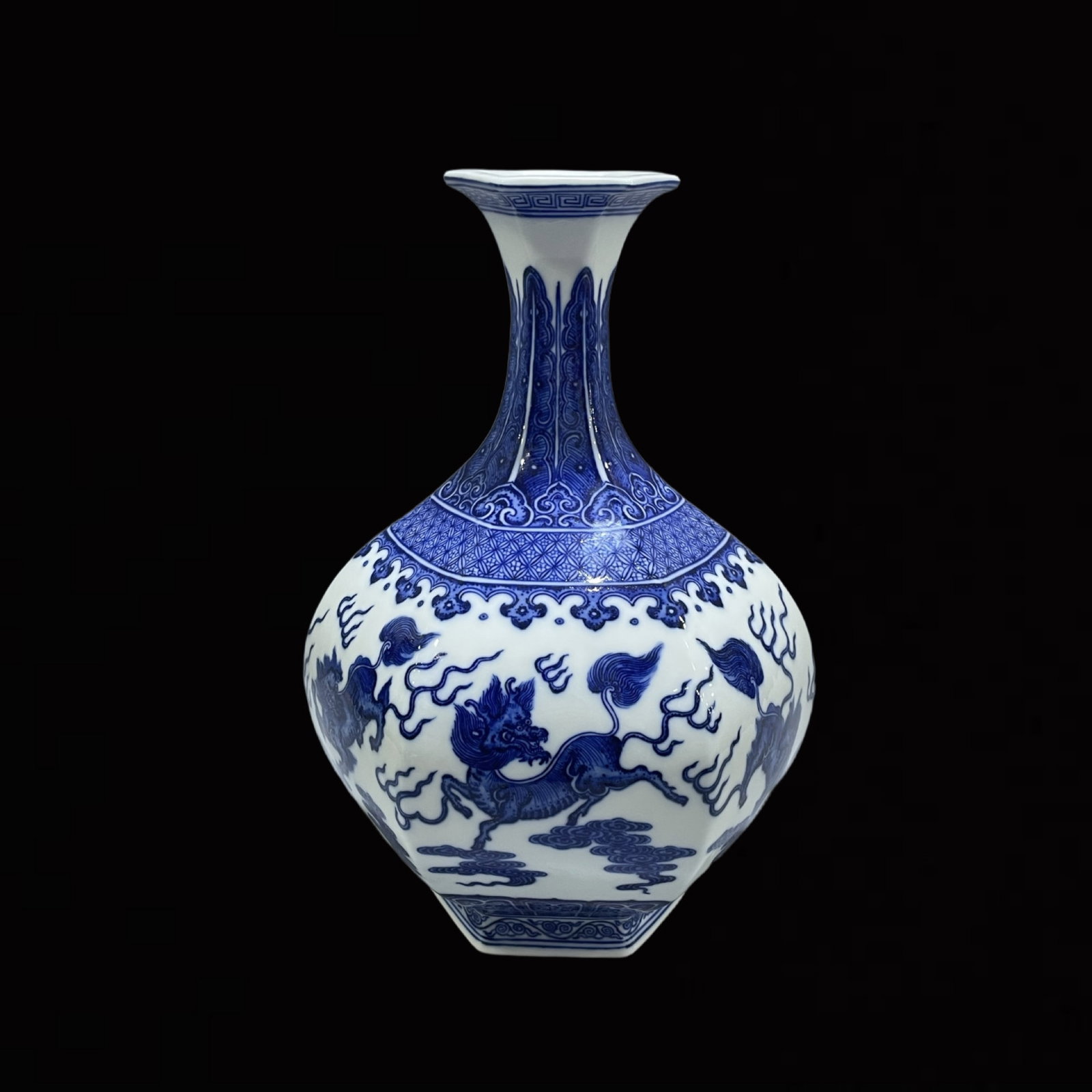 A Rare Blue and White Auspicious Cloud and Kylin Pattern Vase: A Rare Blue and White Auspicious Cloud and Kylin Pattern Vase,Qing Dynasty,China,Qianlong Six-character Mark,Size:12.8inx8.7in 青花祥云麒麟纹瓶,中