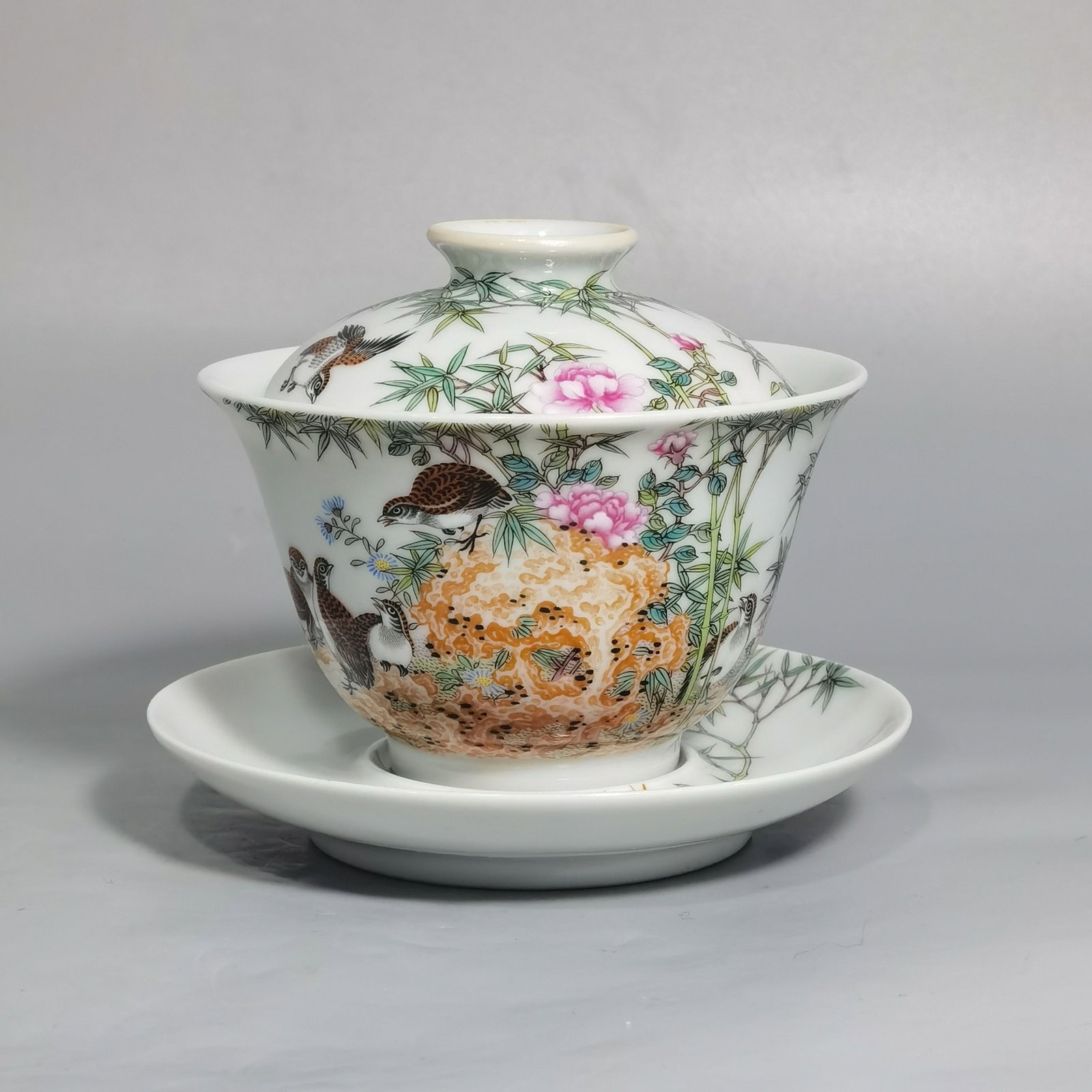 An Exquisite Enamel Flower and Bird Pattern Bowl with Cover,with poem: An Exquisite Enamel Flower and Bird Pattern Bowl with Cover,with poem,Qing Dynasty,China,Yongzheng Six-character Mark,Size:3.5inx4.3in 珐琅彩花鸟纹盖碗,