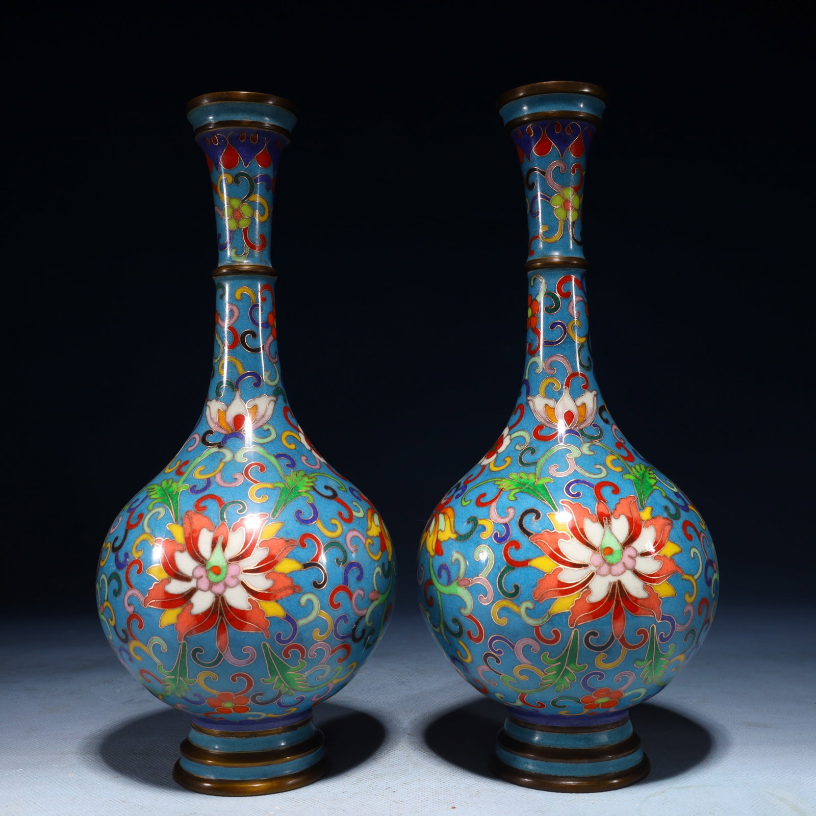 A Pair of Exquisite Cloisonne Lotus Pattern Vases: A Pair of Exquisite Cloisonne Lotus Pattern Vases,Qing Dynasty,China,Qianlong Four-character Mark,Size:10.6inx4.7inx4.7in,Weight:2300g