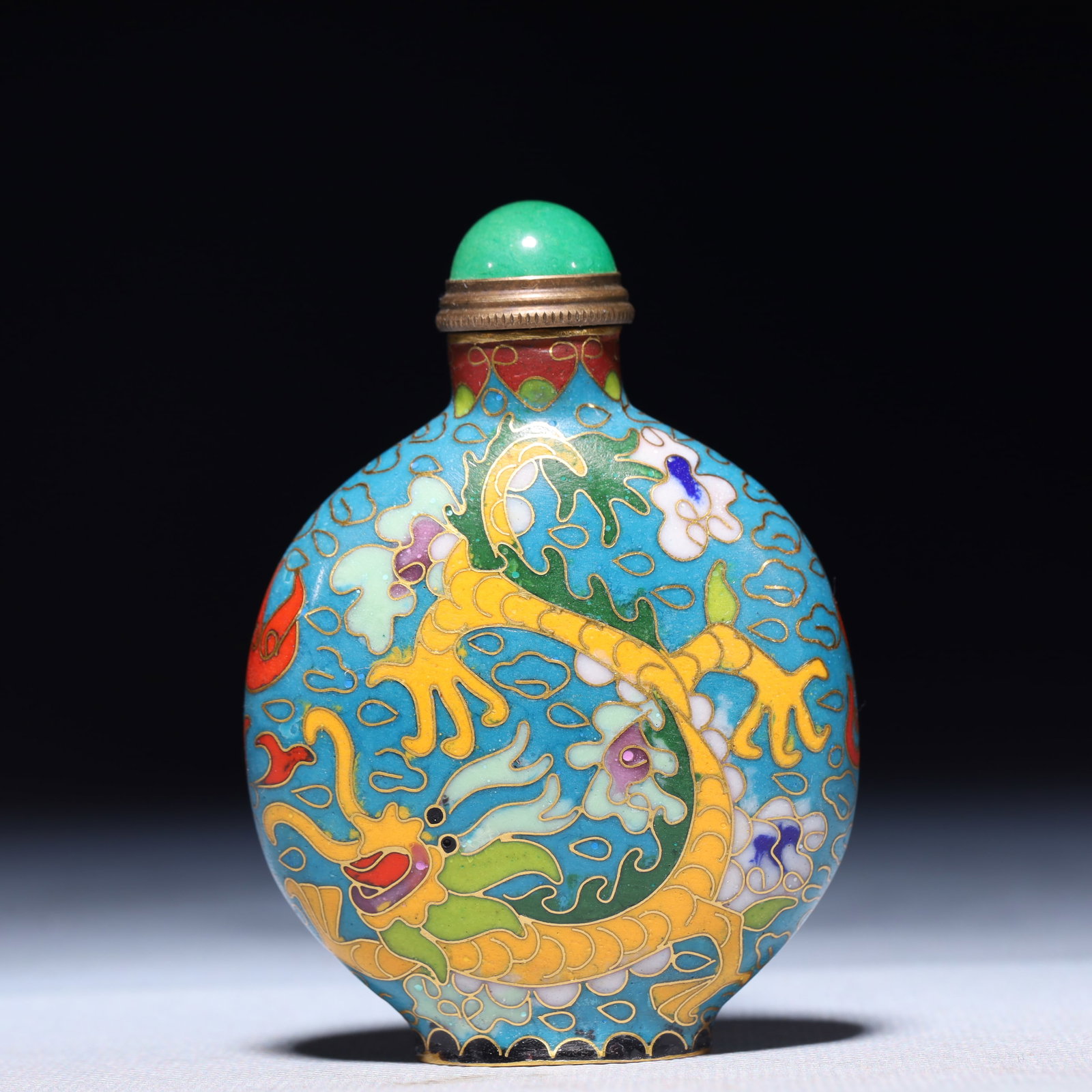 An Exquisite Cloisonne Auspicious Cloud and Dragon Pattern Snuff Bottle: An Exquisite Cloisonne Auspicious Cloud and Dragon Pattern Snuff Bottle,Qing Dynasty,China,Size:2.4inx0.8inx3.1in,Weight:78.7g 景泰蓝祥云龙纹鼻烟&