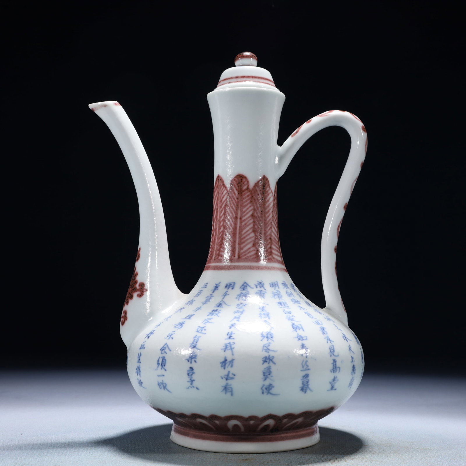An Exquisite Blue and White Underglaze-Red Flower Pattern Ewer,with poem: An Exquisite Blue and White Underglaze-Red Flower Pattern Ewer,with poem,Ming Dynasty,China,Xuande Six-character Mark,Size:6.7inx4.7inx8.7in,Weight:350g