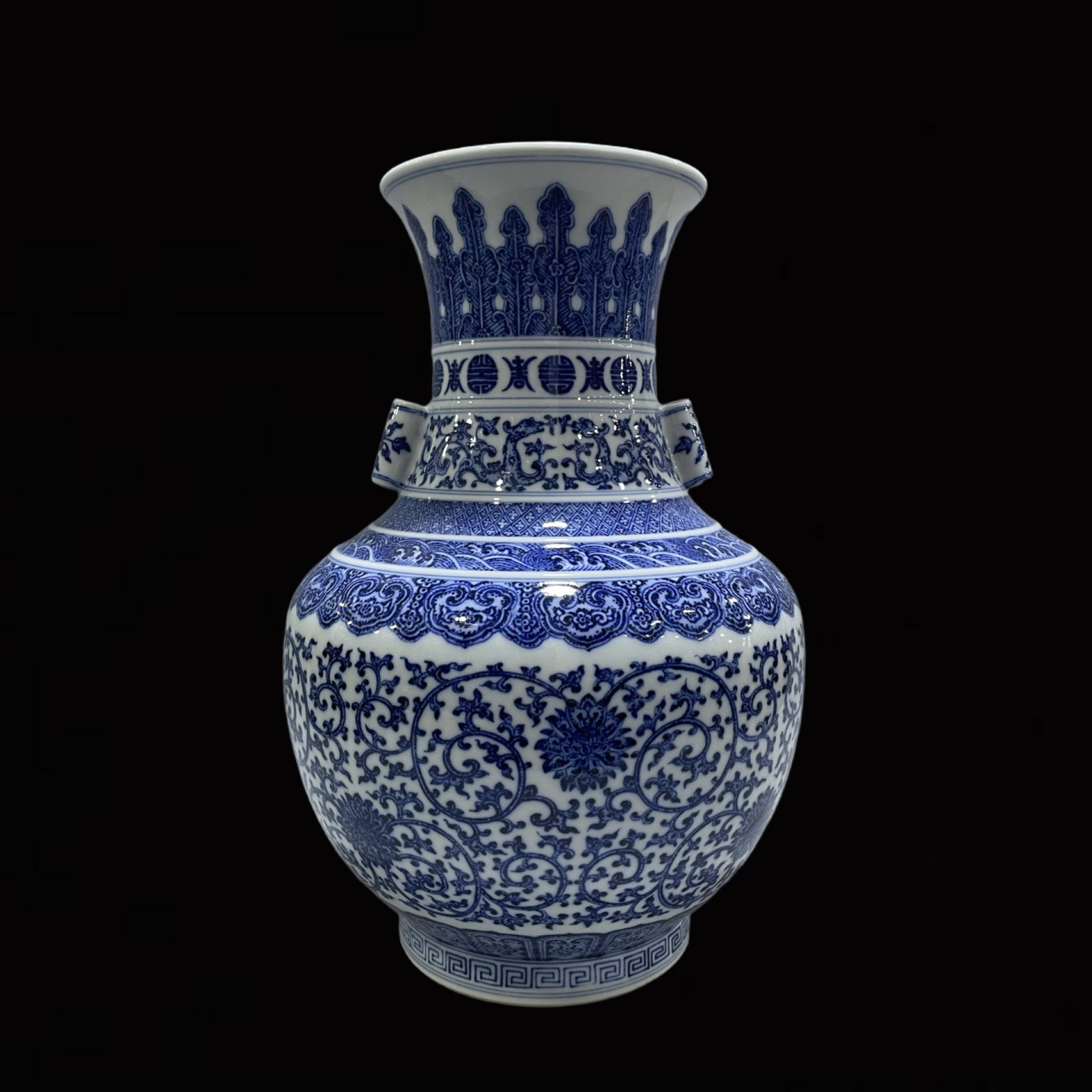 A Rare Blue and White Lotus Pattern Double-Ears Vase: A Rare Blue and White Lotus Pattern Double-Ears Vase,Qing Dynasty,China,Qianlong Six-character Mark,Size:14.4inx9.4in 青花缠枝莲纹双耳瓶,中&