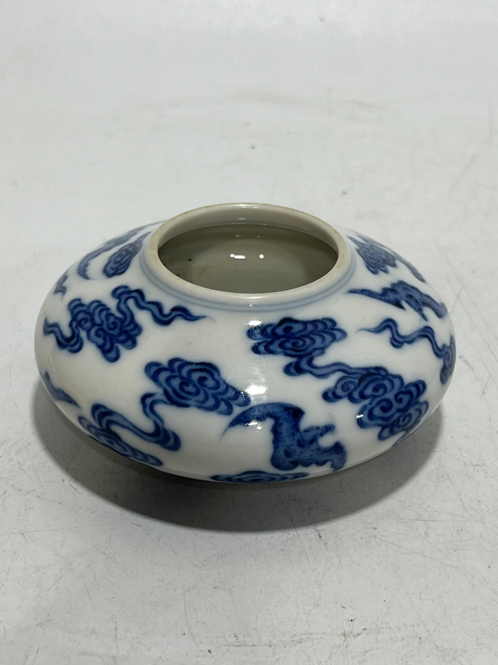 An Exquisite Blue and White Auspicious Cloud and Bats Pattern Water Pot: An Exquisite Blue and White Auspicious Cloud and Bats Pattern Water Pot,Qing Dynasty,China,Qianlong Six-character Mark,Size:1.4in 青花祥云蝙蝠纹水௠