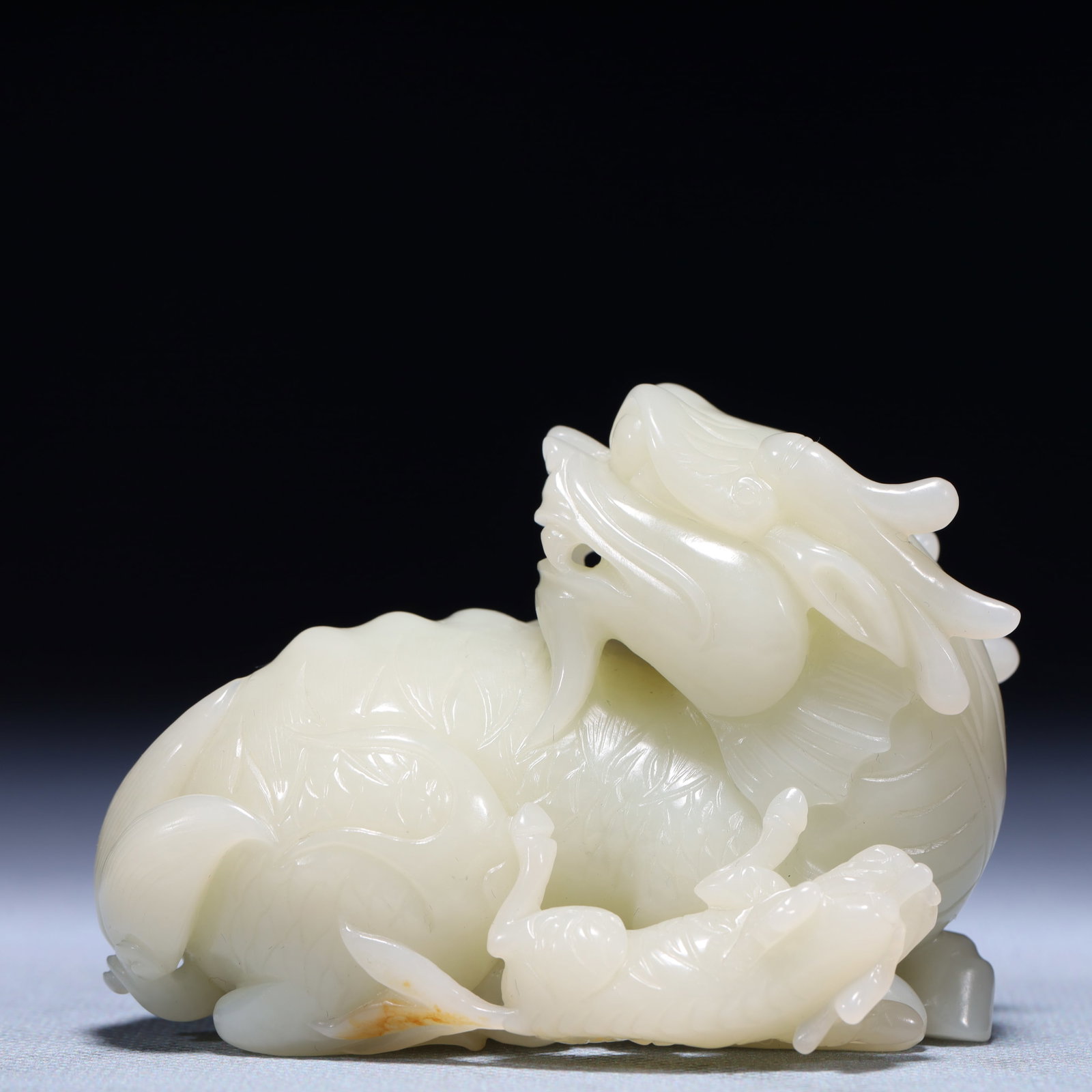 An Exquisite White Jade Auspicious Beast Ornament (1 of 11)