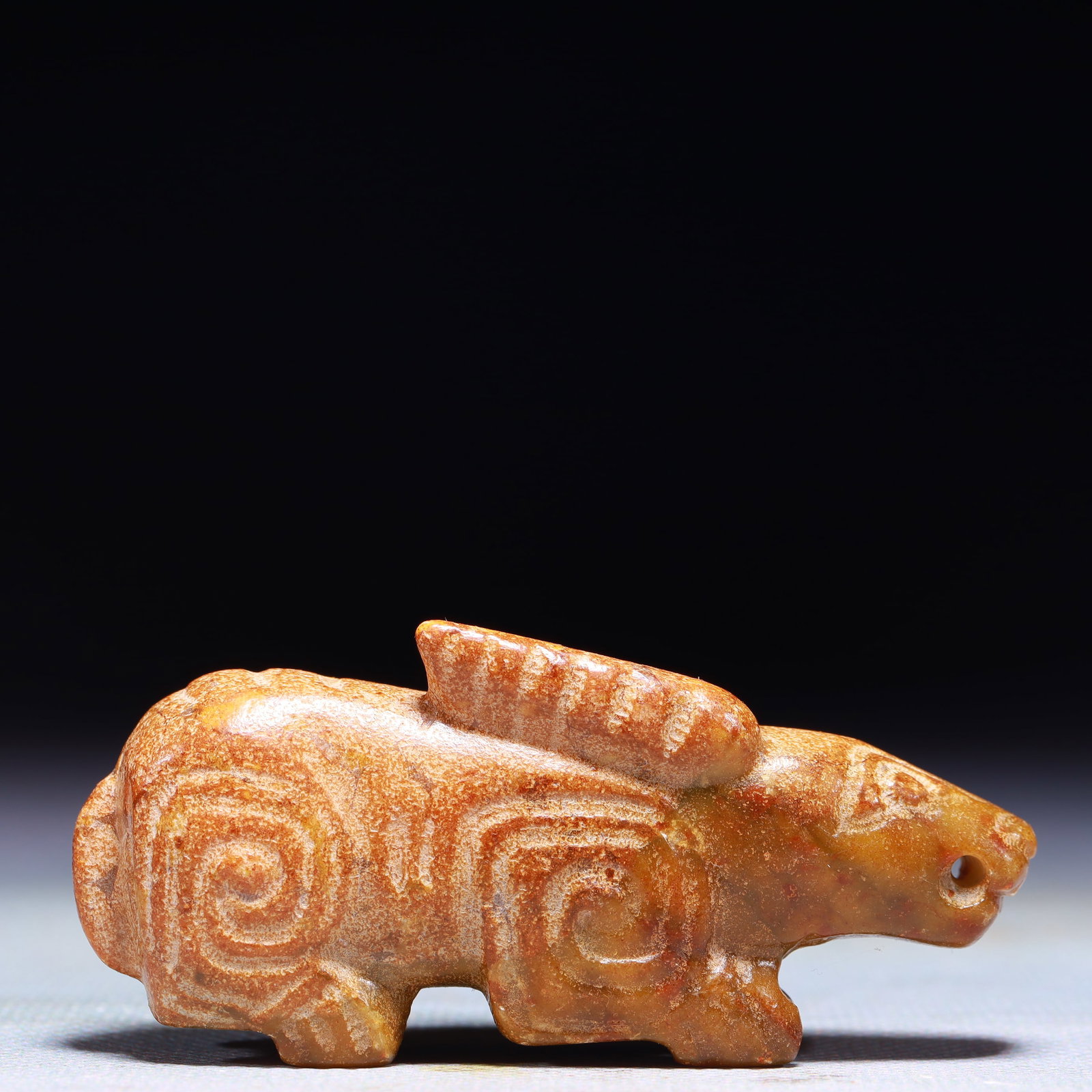 An Exquisite Archaic Jade Rabbit Ornament: An Exquisite Archaic Jade Rabbit Ornament,Ancient Time,China,Size:3inx0.8inx1.2in,Weight:74.1g 高古玉兔子摆件中国远古时期
