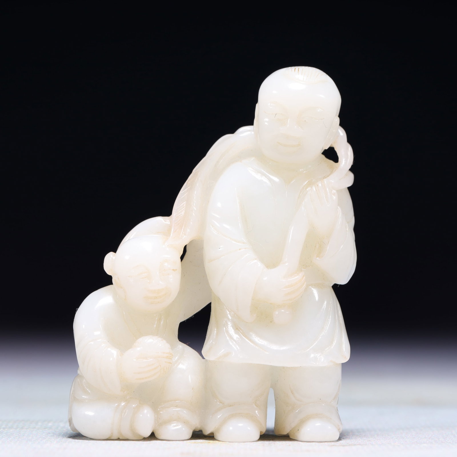 An Exquisite White Jade Figure Ornament: An Exquisite White Jade Figure Ornament,Qing Dynasty,China,Size:2inx0.6inx2.8in,Weight:90g 白玉人物摆件,中国清代