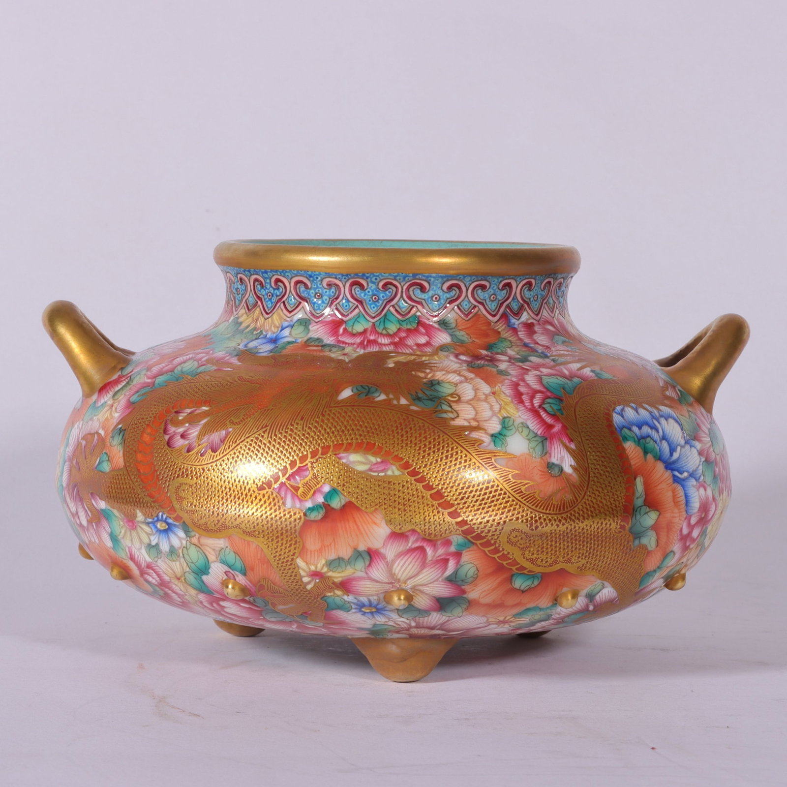 An Exquisite Enamel Painted Gold Flower and Dragon Pattern Double-Ears and Tripod Censer: An Exquisite Enamel Painted Gold Flower and Dragon Pattern Double-Ears and Tripod Censer,Qing Dynasty,China,Yongzheng Four-character Mark,Size:3.1inx5.5in