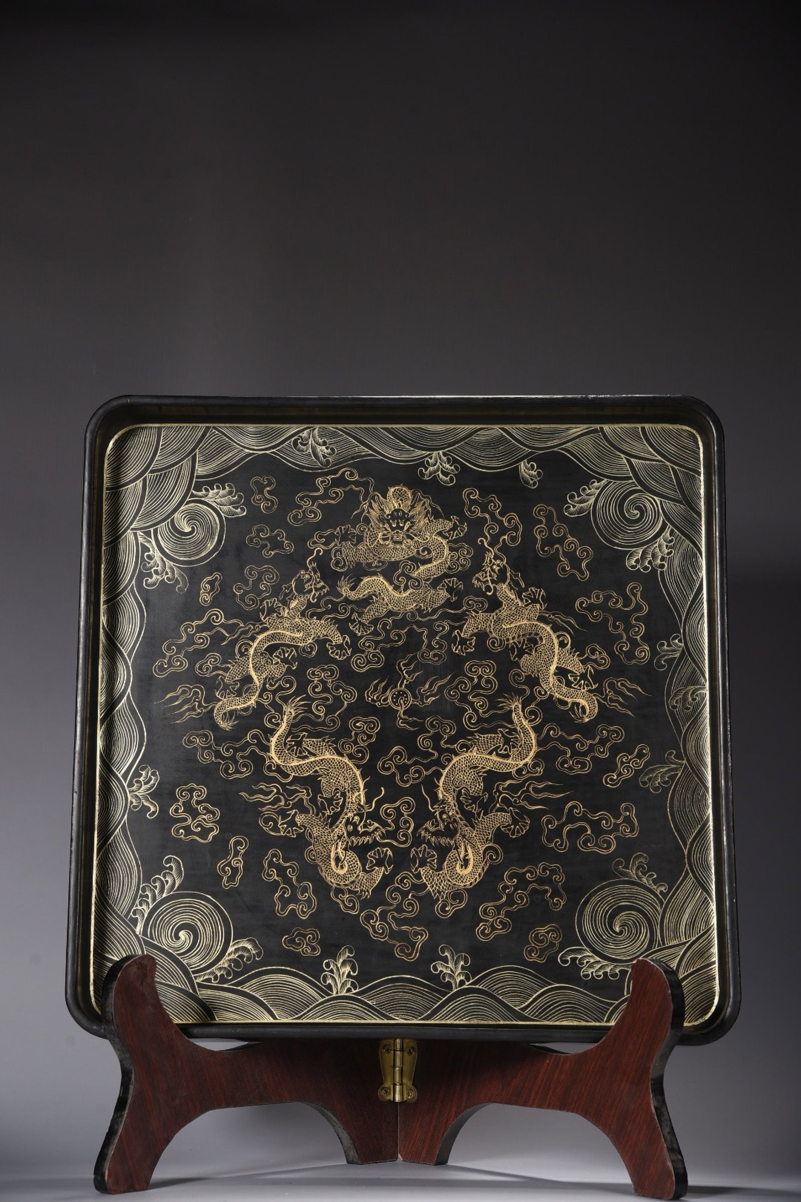 An Exquisite Carved Lacquer Painted Gold Dragon Pattern Plate: An Exquisite Carved Lacquer Painted Gold Dragon Pattern Plate,Qing Dynasty,China,With Mark,Size:1.2inx13in,Weight:530g 漆器描金龙纹盘子,中国