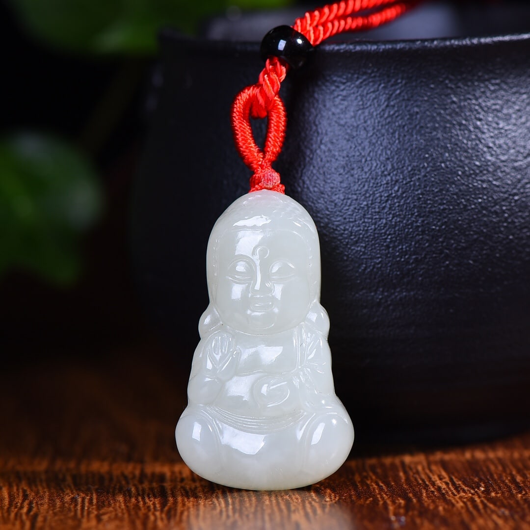 An Exquisite White Jade Buddha Statue Pendant: An Exquisite White Jade Buddha Statue Pendant,Size:0.8inx1.4in 白玉佛像挂件