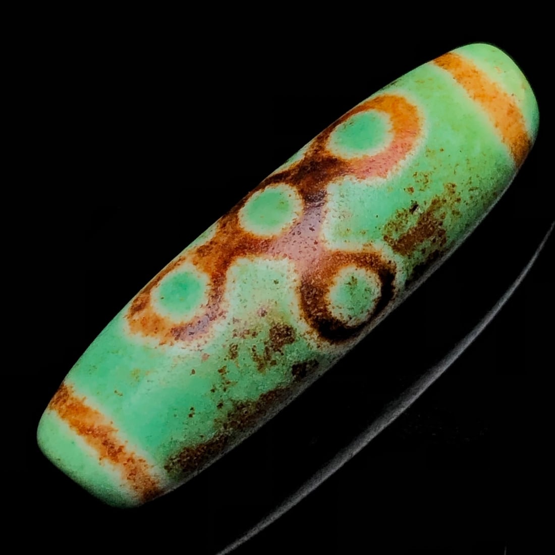 An Exquisite Dzi Bead Pendant: An Exquisite Dzi Bead Pendant,Size:1.5inx0.4in,Weight:6.7g 天珠挂件