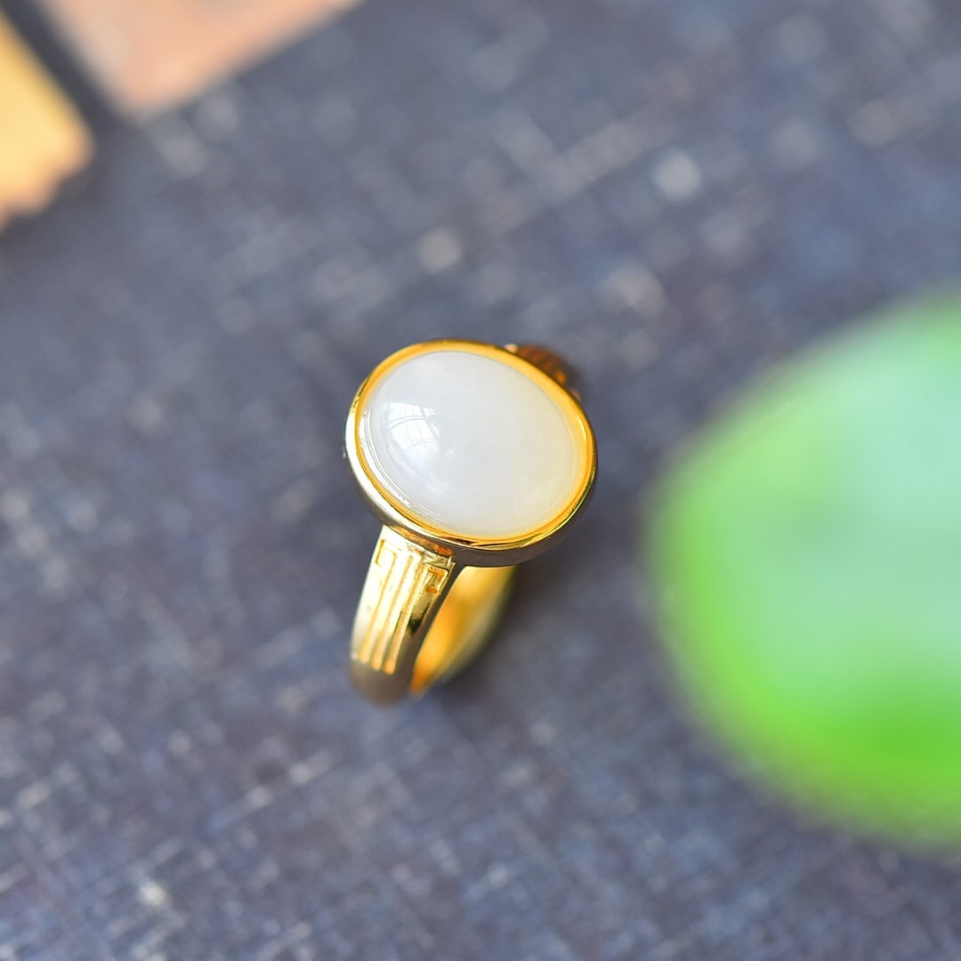 An Exquisite Sterling Silver-Gold Plated Inlaid White Jade Ring: An Exquisite Sterling Silver-Gold Plated Inlaid White Jade Ring,Size:0.4inx0.5in 纯银镀金镶白玉戒指