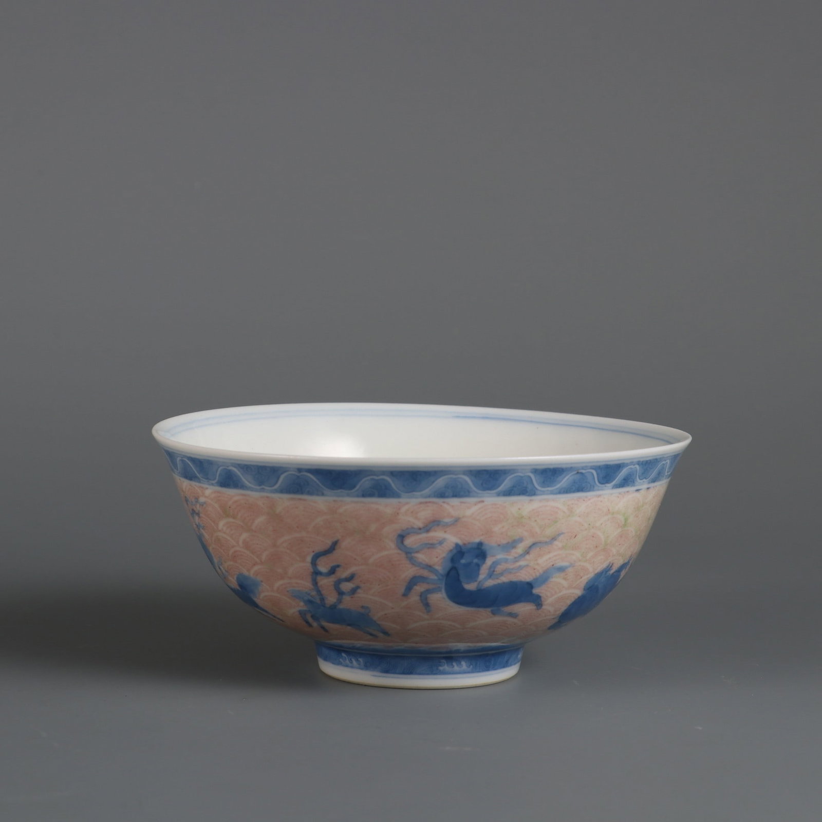 An Exquisite Blue and White Underglaze-Red Auspicious Beast Pattern Bowl: An Exquisite Blue and White Underglaze-Red Auspicious Beast Pattern Bowl Qing Dynasty, China Qianlong Six-character Mark Size:2.1inx4.4in青花釉里红海八怪