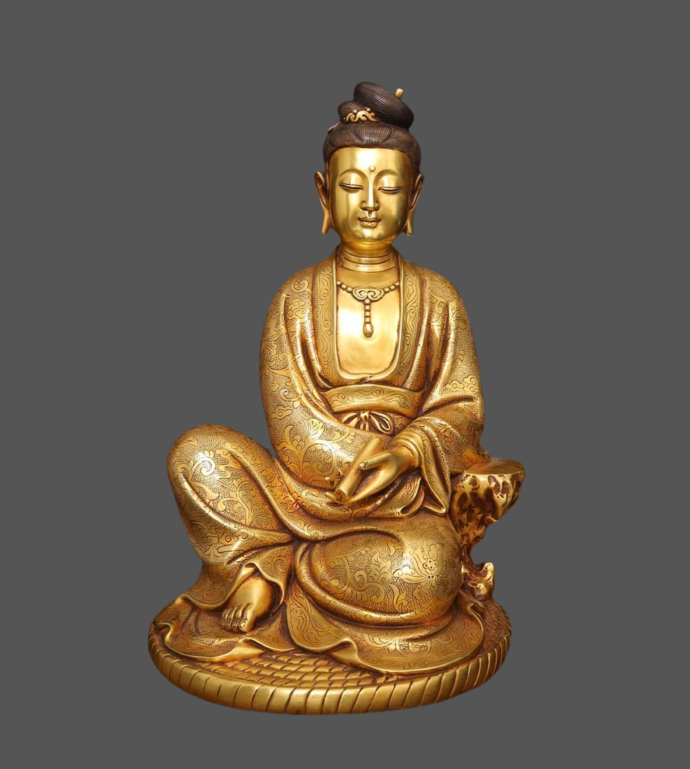 An Exquisite Gilt Bronze Statue of Avalokitesvara Ornament: An Exquisite Gilt Bronze Statue of Avalokitesvara Ornament Ming Dynasty, China Yongle Six-character Mark Size:16.5inx10in Weight:11.30kg铜鎏金观音摆件