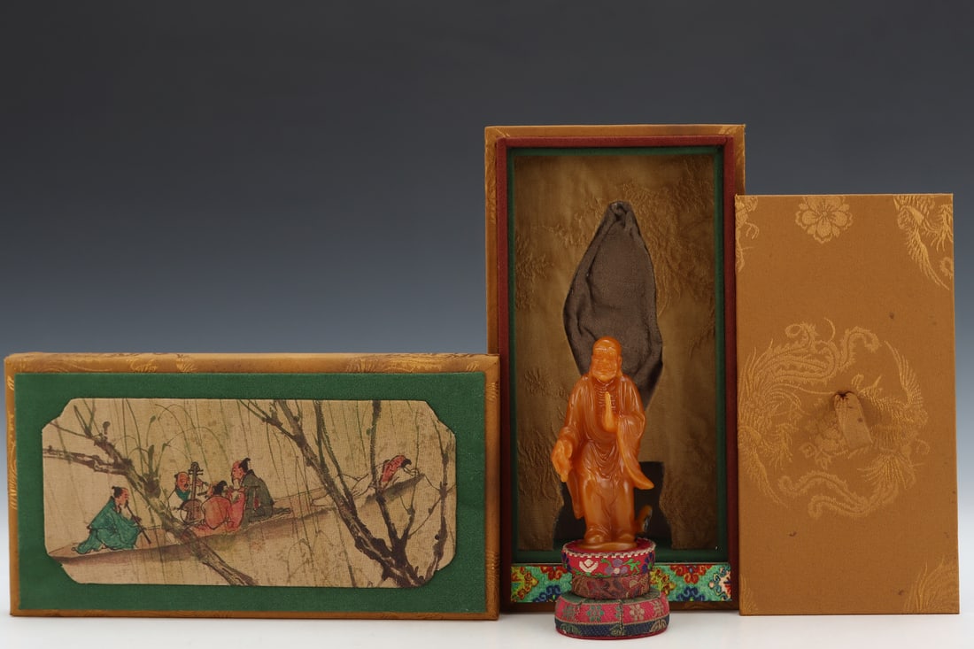 An Exquisite Tianhuang Stone Statue of Arhat Ornament: An Exquisite Tianhuang Stone Statue of Arhat Ornament Qing Dynasty, China Size:1.8inx1inx3.6in Weight:84.3g田黄石罗汉人物摆件