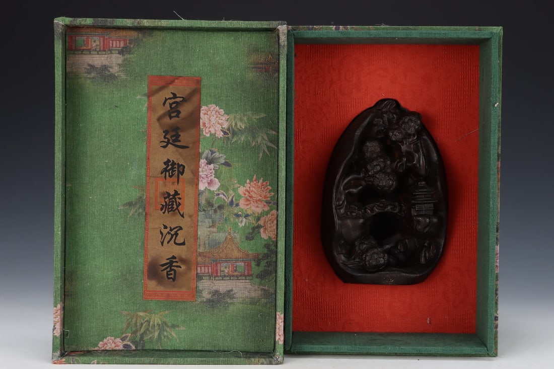 An Exquisite Eaglewood Landscape Pattern Ornament: An Exquisite Eaglewood Landscape Pattern Ornament Qing Dynasty, China Size:4.7inx3.1inx7.1in沉香远山近林亭台楼阁