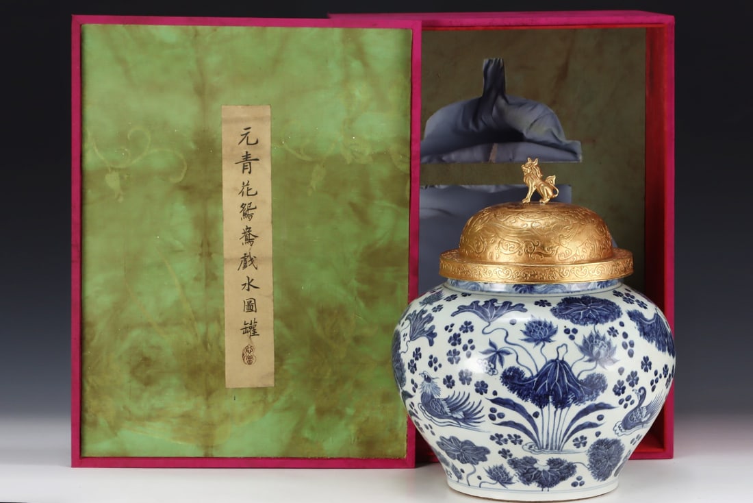 An Exquisite Blue and White Flower and Bird Pattern Jar: An Exquisite Blue and White Flower and Bird Pattern Jar Yuan Dynasty, China Size:15.6inx13.2in青花荷叶鸳鸯图纹罐 中国元代