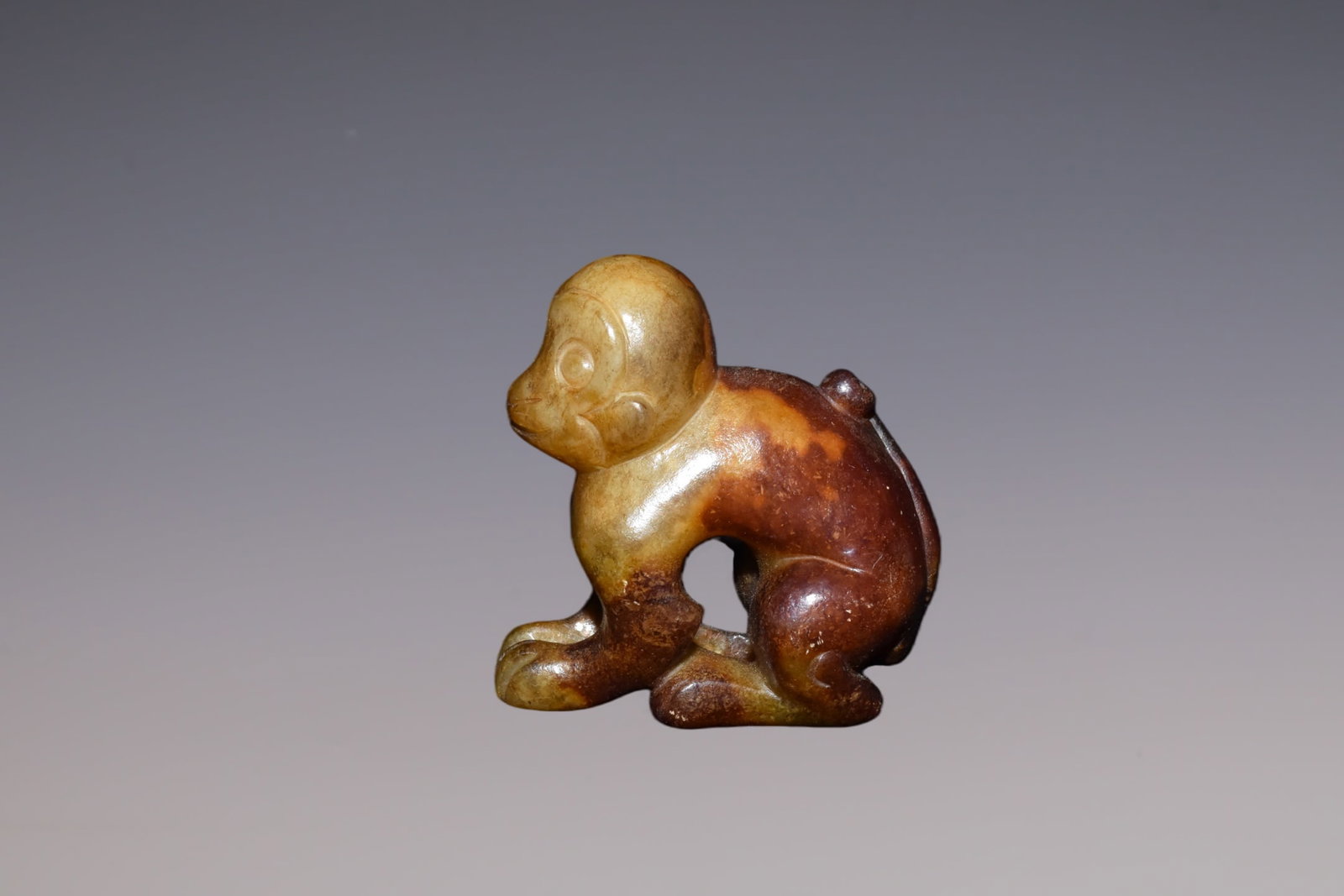 An Exquisite White Jade Monkey: An Exquisite White Jade Monkey Han Dynasty, China Size:1.8inx1.4in Weight:30g白玉猴子 中国汉代 Size:4.5cmx3.5cm Weight:30g