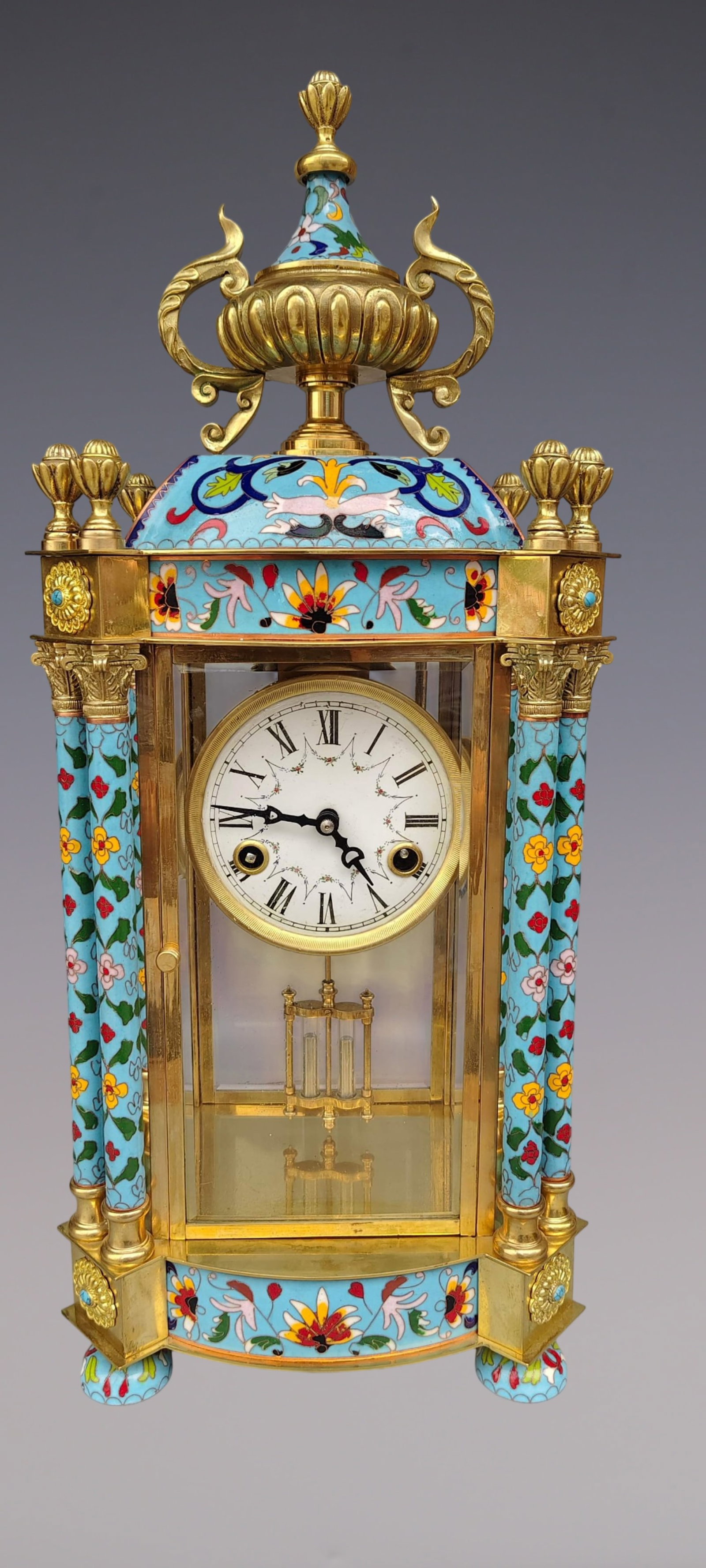 An Exquisite Gilt Bronze Lotus Pattern Clock: An Exquisite Gilt Bronze Lotus Pattern Clock Size:22inx9.8inx7.1in铜鎏金缠枝莲纹钟表 Size:56cmx25cmx18cm