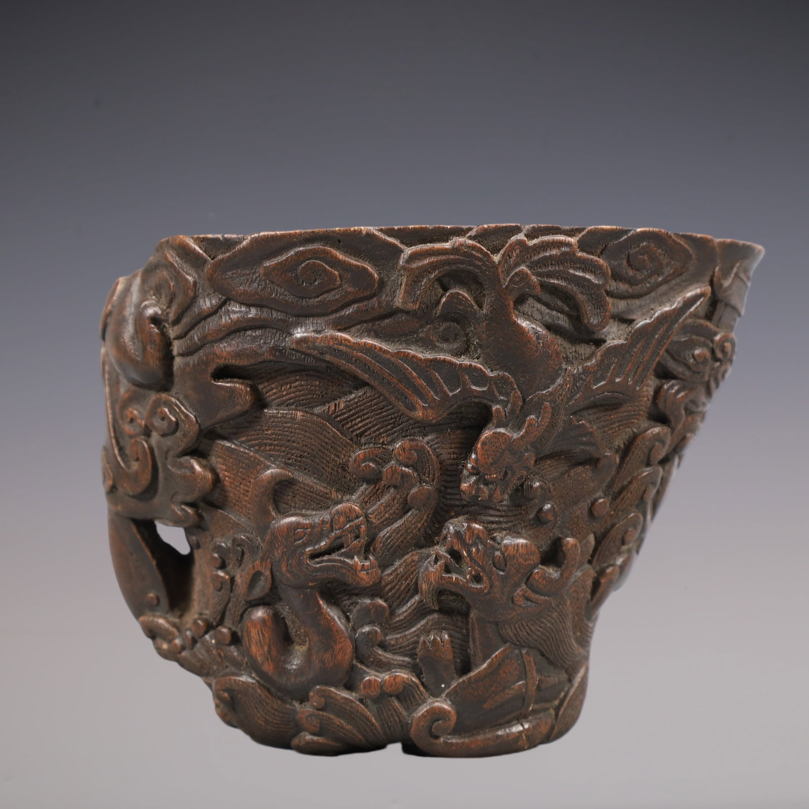 A Exquisite Eaglewood Auspicious Beast Pattern Cup: A Exquisite Eaglewood Auspicious Beast Pattern Cup Qing Dynasty, China Size:5.9inx4.7inx4.3in Weight:250g沉香木瑞兽纹杯 中国清代 Size: