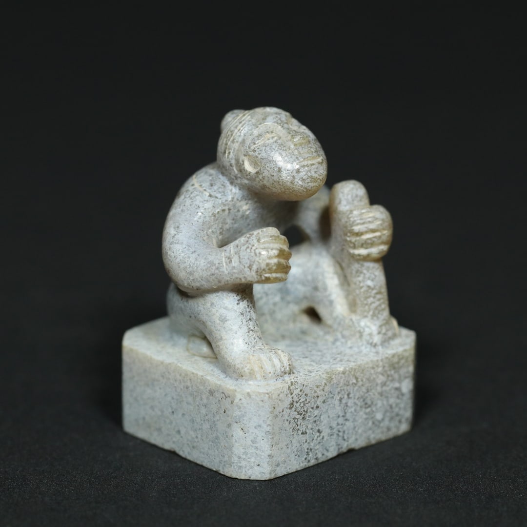An Exquisite White Jade Figure Seal: An Exquisite White Jade Figure Seal Han Dynasty, China Size:1.6inx1.2inx1.1in Weight:44.3g白玉人钮印章 中国汉代 Size:4cmx3cmx2.7cm