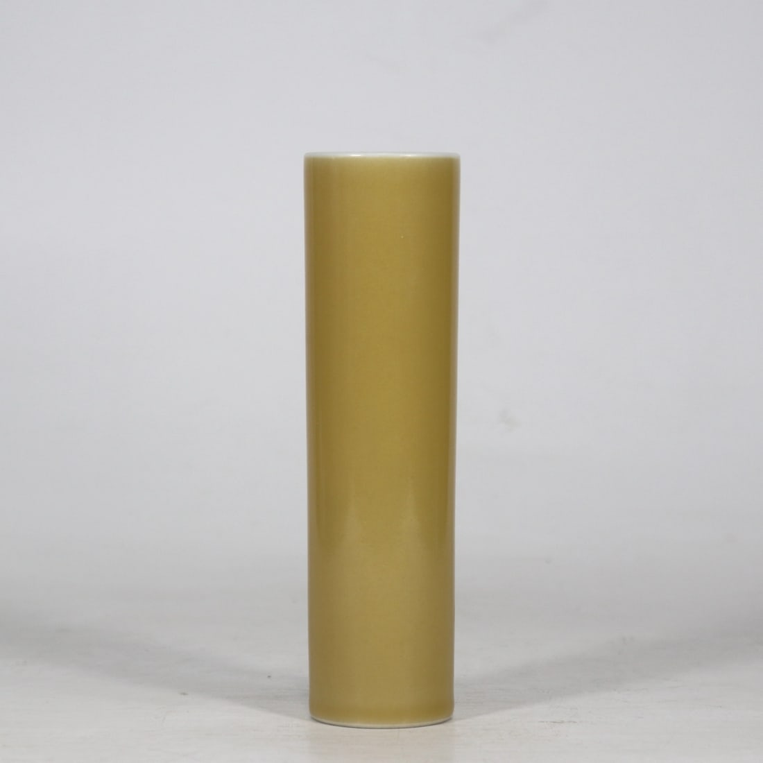 An Exquisite Yellow Glazed Incense Tube: An Exquisite Yellow Glazed Incense Tube Qing Dynasty, China Yongzheng Six-character Mark Size:6.3inx1.8in米黄釉香筒 中国清代