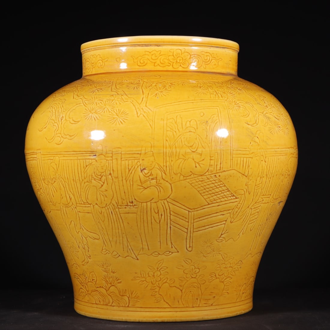 An Exquisite Yellow Glazed Character and Story Pattern Jar: An Exquisite Yellow Glazed Character and Story Pattern Jar Ming Dynasty, China Jiajing Six-character Mark Size:8.7inx9.1in鸡黄釉刻花人物罐