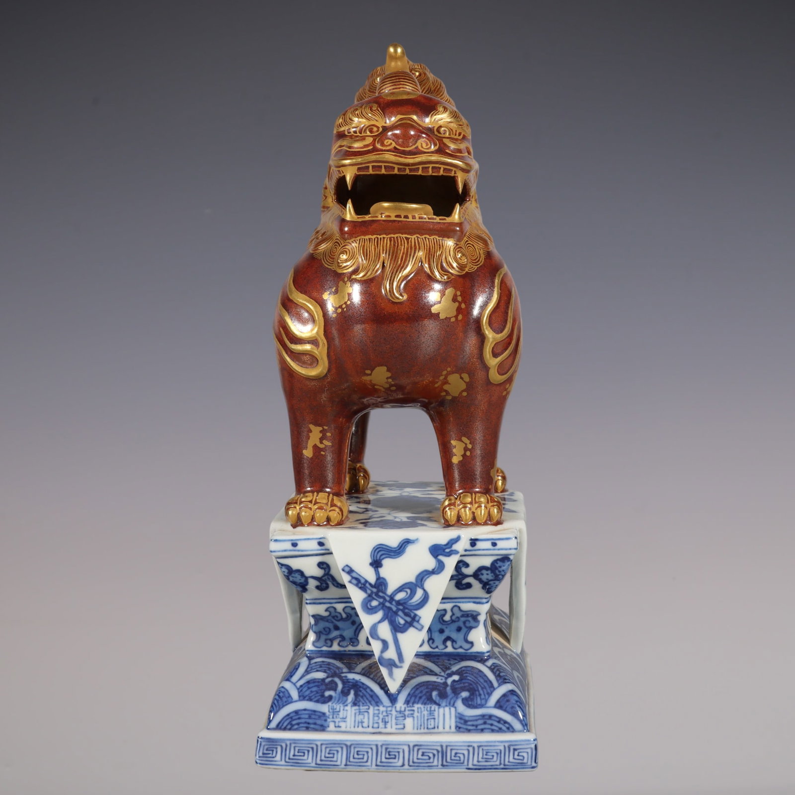 An Exquisite Blue and White Painted Gold Kylin Paper Weight: An Exquisite Blue and White Painted Gold Kylin Paper Weight Qing Dynasty, China Qianlong Six-character Mark
