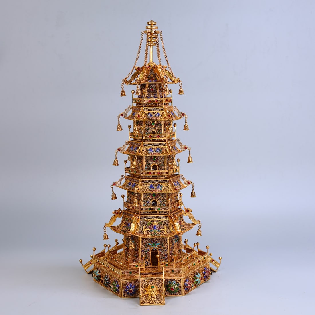 An Exquisite Gilt Bronze Inlaid Gems Pagoda: An Exquisite Gilt Bronze Inlaid Gems Pagoda Qing Dynasty, China Qianlong Four-character Mark Size:19.7inx9.8in Weight:2420g铜鎏金嵌宝楼阁式佛â