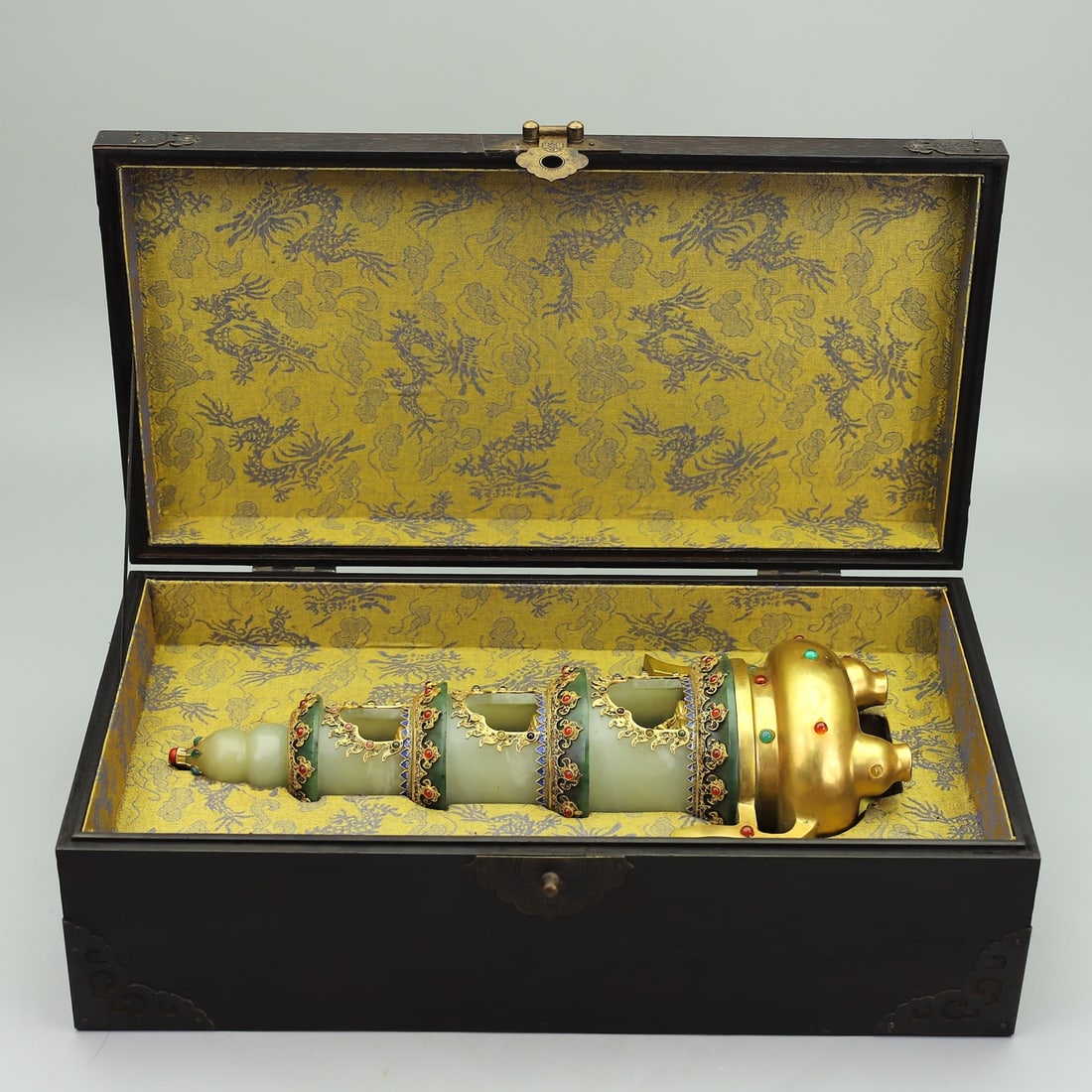 An Exquisite Gilt Bronze Inlaid White Jade Pagoda Ornament: An Exquisite Gilt Bronze Inlaid White Jade Pagoda Ornament Qing Dynasty, China Size:22.8inx9.1inx7in Weight:4070g Size:5.3inx5.3inx20in Weight:3705g铜鎏金镶嵌白