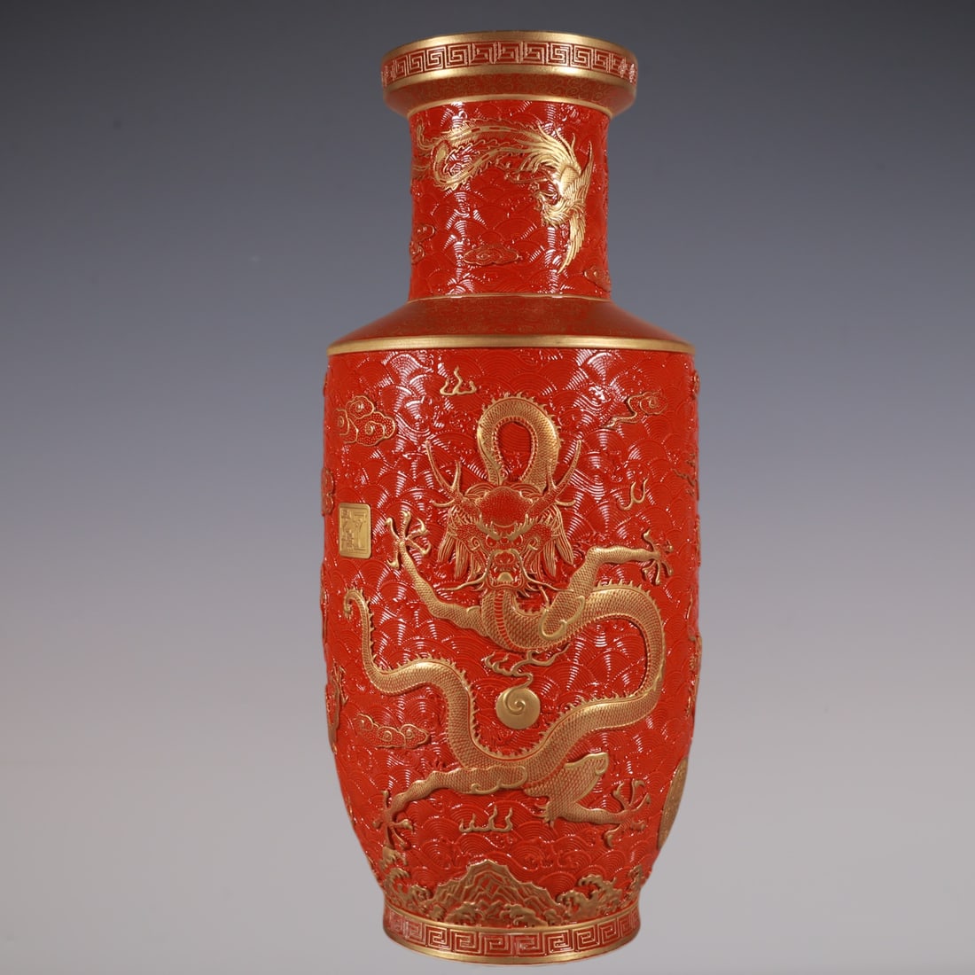 An Exquisite Iron-Red Painted Gold Dragon and Phoenix Pattern Seawater Pattern Vase: An Exquisite Iron-Red Painted Gold Dragon and Phoenix Pattern Seawater Pattern Vase Qing Dynasty, China Qianlong Six-character Mark