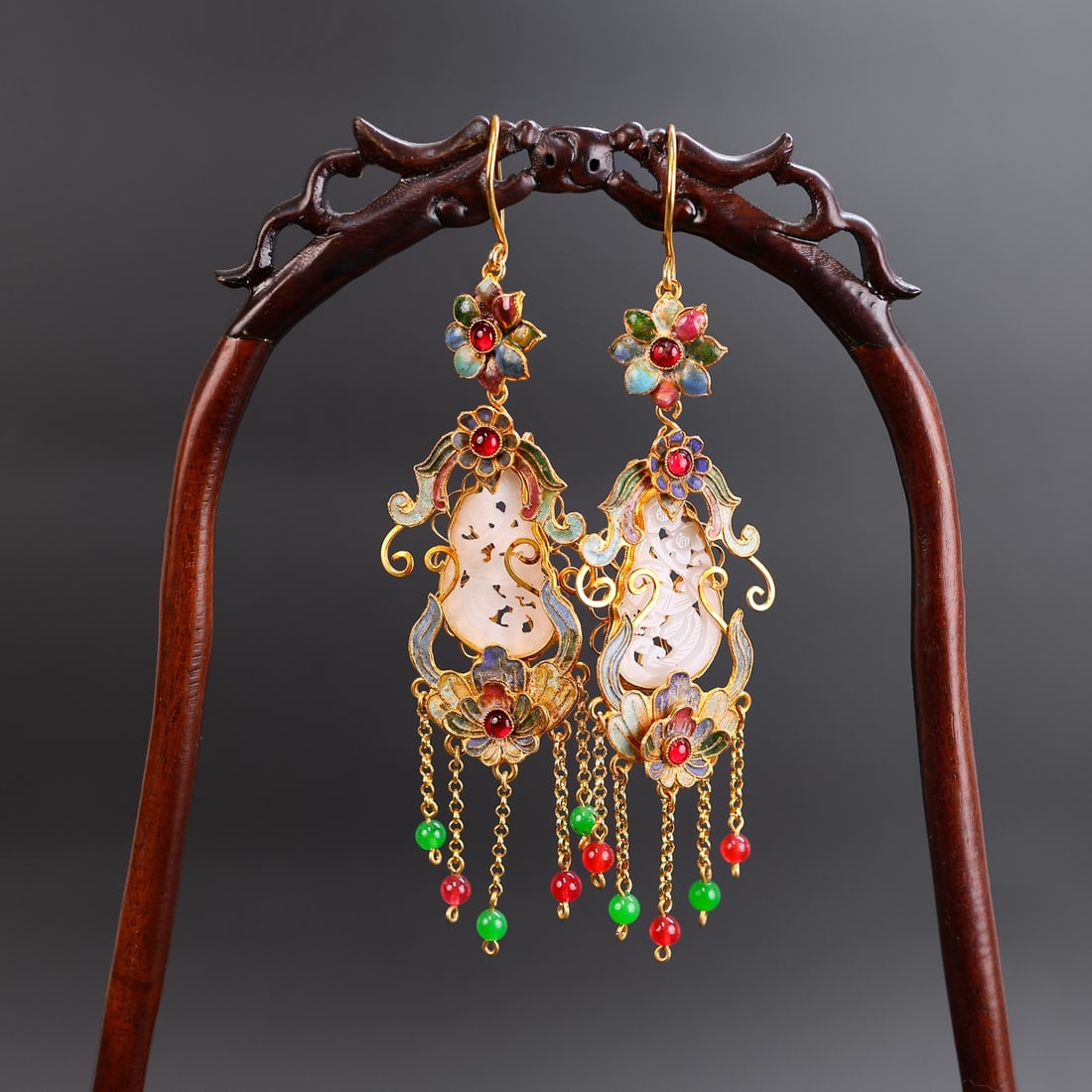 A Pair of Exquisite Gilt Bronze Inlaid White Jade Earrings: A Pair of Exquisite Gilt Bronze Inlaid White Jade Earrings Qing Dynasty, China Size:6.3inx2in Weight:58g铜鎏金镶嵌白玉耳环一对
