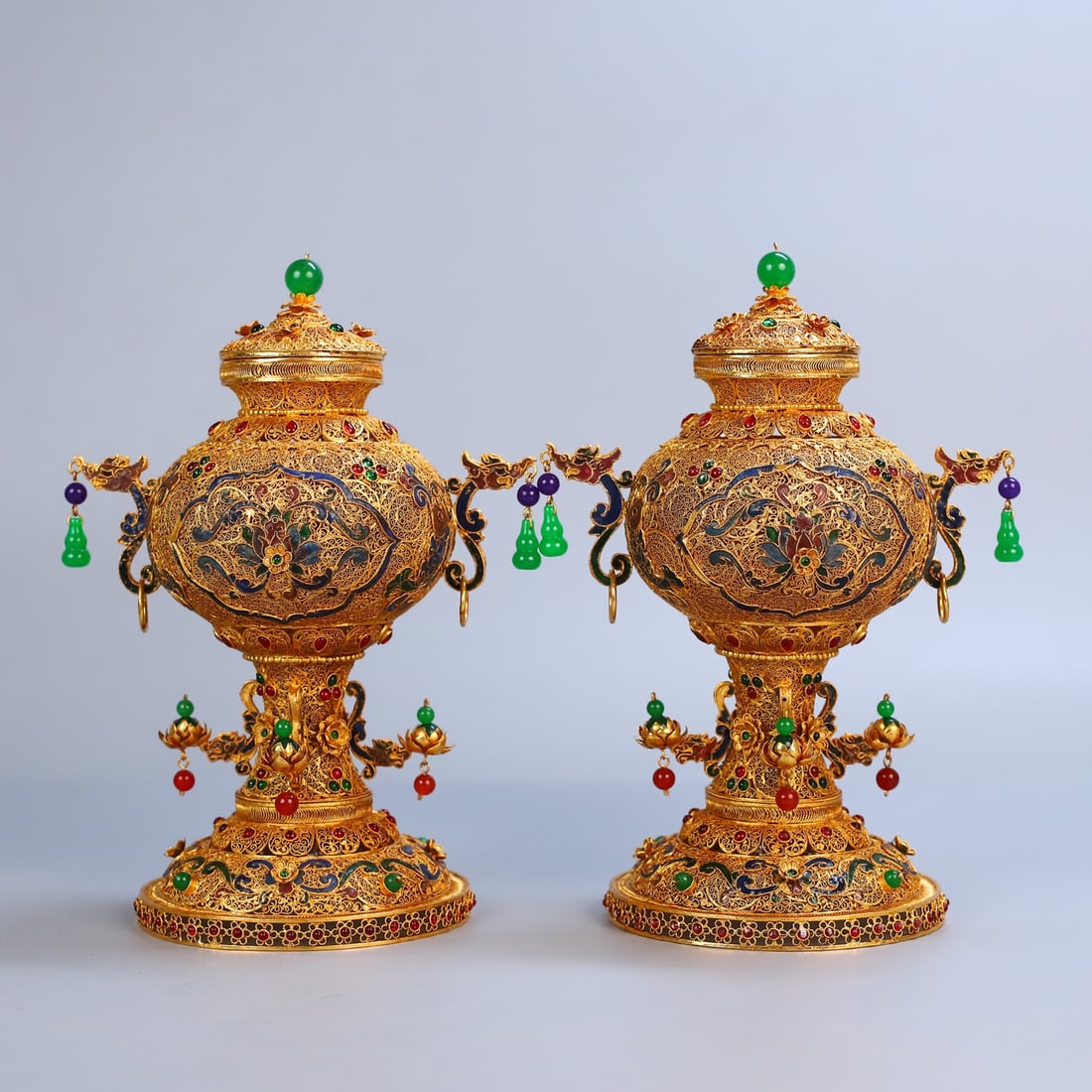 An Exquisite Gilt Bronze Inlaid Gems Lotus Pattern Jar: An Exquisite Gilt Bronze Inlaid Gems Lotus Pattern Jar Qing Dynasty, China Qianlong Four-character Mark Size:9.8inx7.1in